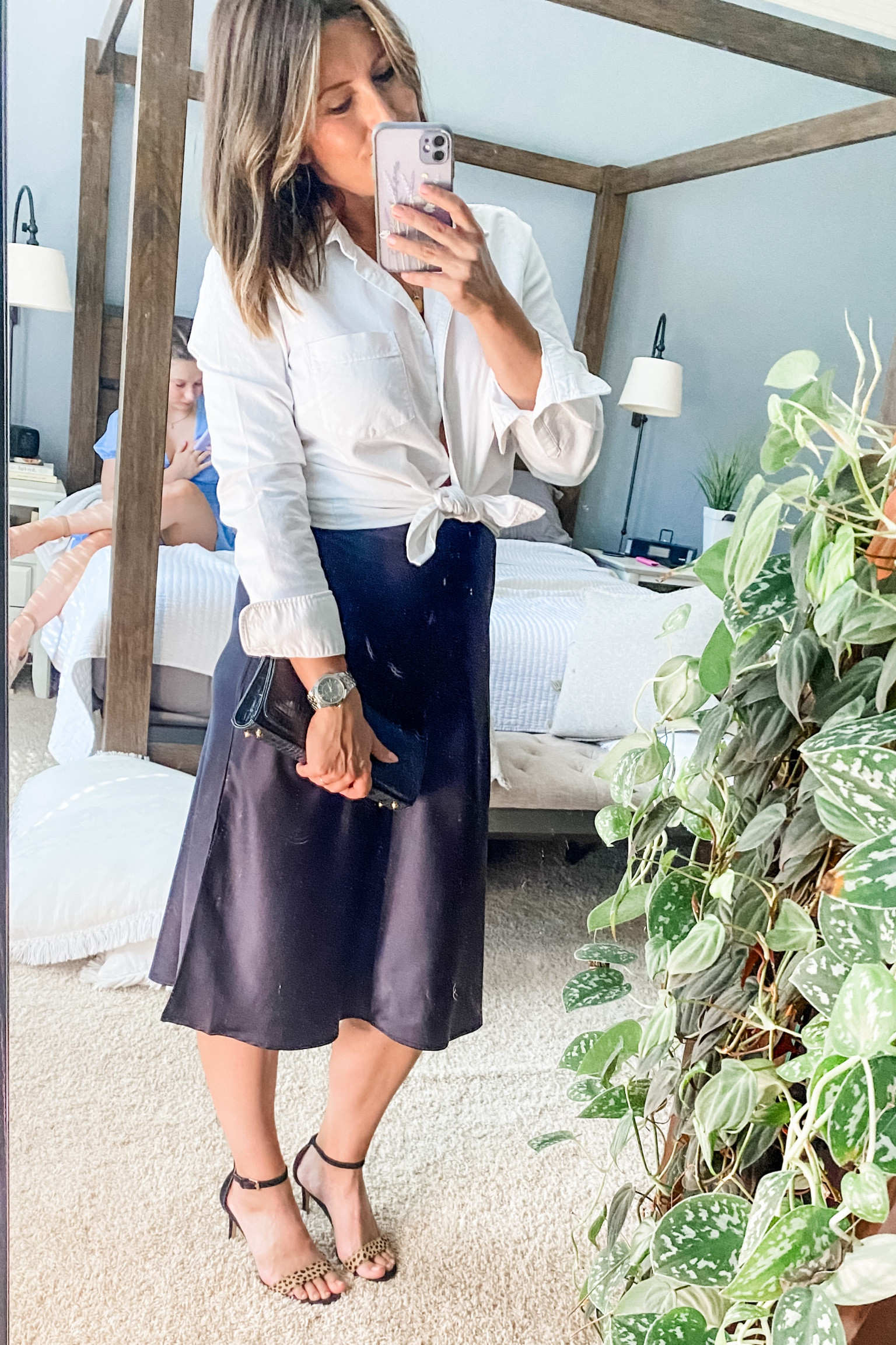 When in doubt, the white button down ALWAYS wins.
Gymnastics banquet night for my girl, and I was not into buying something new for one night. So I channeled my inner French Lady and used what I had—mixing menswear with classic satin for a look that was timeless and, it turns out, unique.
Tons of compliments, the best one being Kenzie saying I “looked like I was in a Chanel No. 5 commercial.” Little did she know that’s exactly what I was going for.
You don’t need new clothes for every event, y’all, especially if you build a wardrobe of classics. 
(These shoes and this bag are both 5+ years old and still hit 🔥).
So grab some solid staple pieces and get creative, you’ll be surprised with what you find!

#LTKStyleTip #LTKOver40 #LTKFindsUnder50