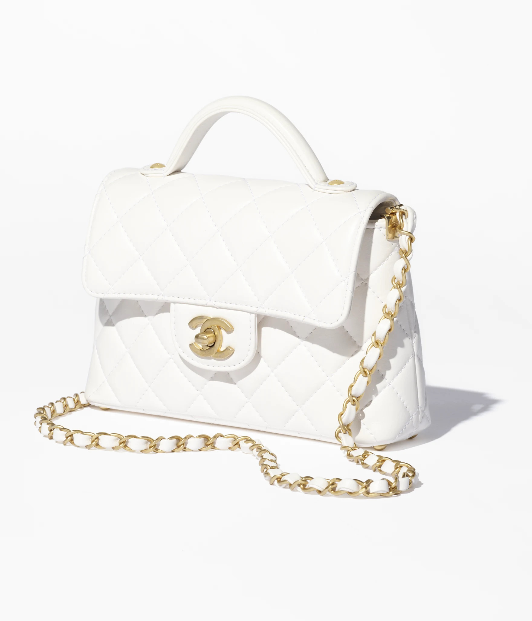 Small flap bag with top handle, Lambskin & gold-tone metal, white — Fashion | CHANEL | Chanel, Inc. (US)