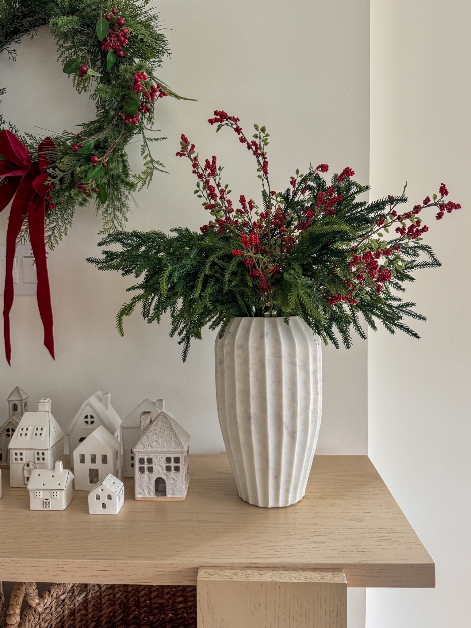 I Mixed Classic Norfolk pine garland with these holiday red berries on my console table for a pop of red! 

#LTKSeasonal #LTKHome #LTKHoliday