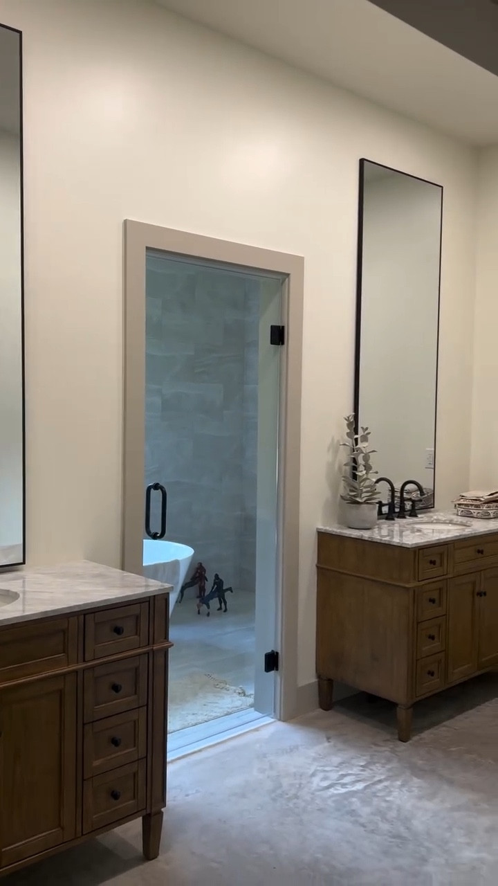 Mixing a little vintage with new modern touches is my JAM!!! The driftwood vanities with the fancy marble tops, the thin modern metal mirrors. It all came together so beautifully! Now I have to decide on sconces! Tag your favorite light brands in the comments, I’d love to support a small business! 

Metal Framed Oversized Mirrors & Vintage inspired vanities: @wayfair COMMENT LINKS For a link to shop all of our bathroom finishes! 

Bathroom goals 
Dream bathroom 
Dream home 
Barndominium
Vintage modern
Modern cottage

#dreambathroom #vintagemodern #moderncottage #bathroomdesign #bathroomgoals #barndominium
