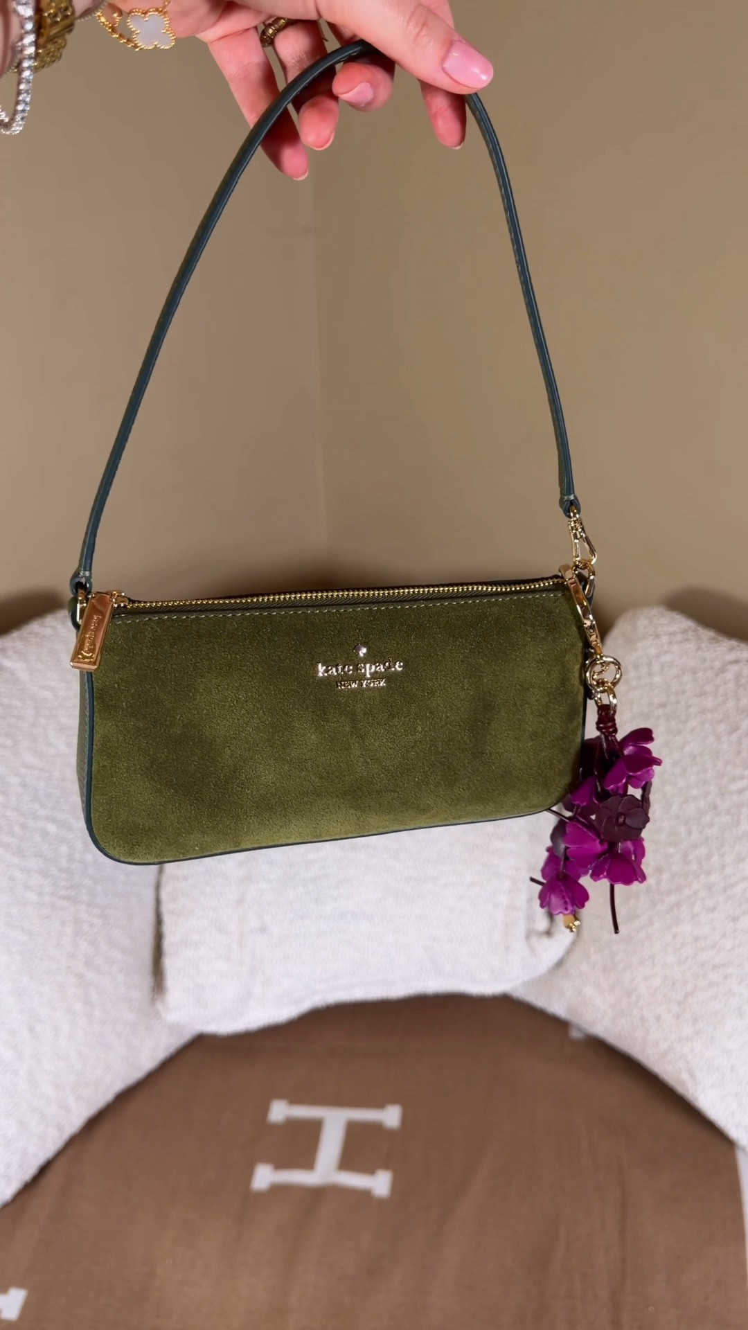 The cutest mini bag for fall in the most beautiful suede color 😍

This mini Gemini bag from Kate Spade is the perfect little size and has the most beautiful olive green shade and the suede feels like such amazing quality!

I added the deep purple bag charm which compliments the olive green so well!