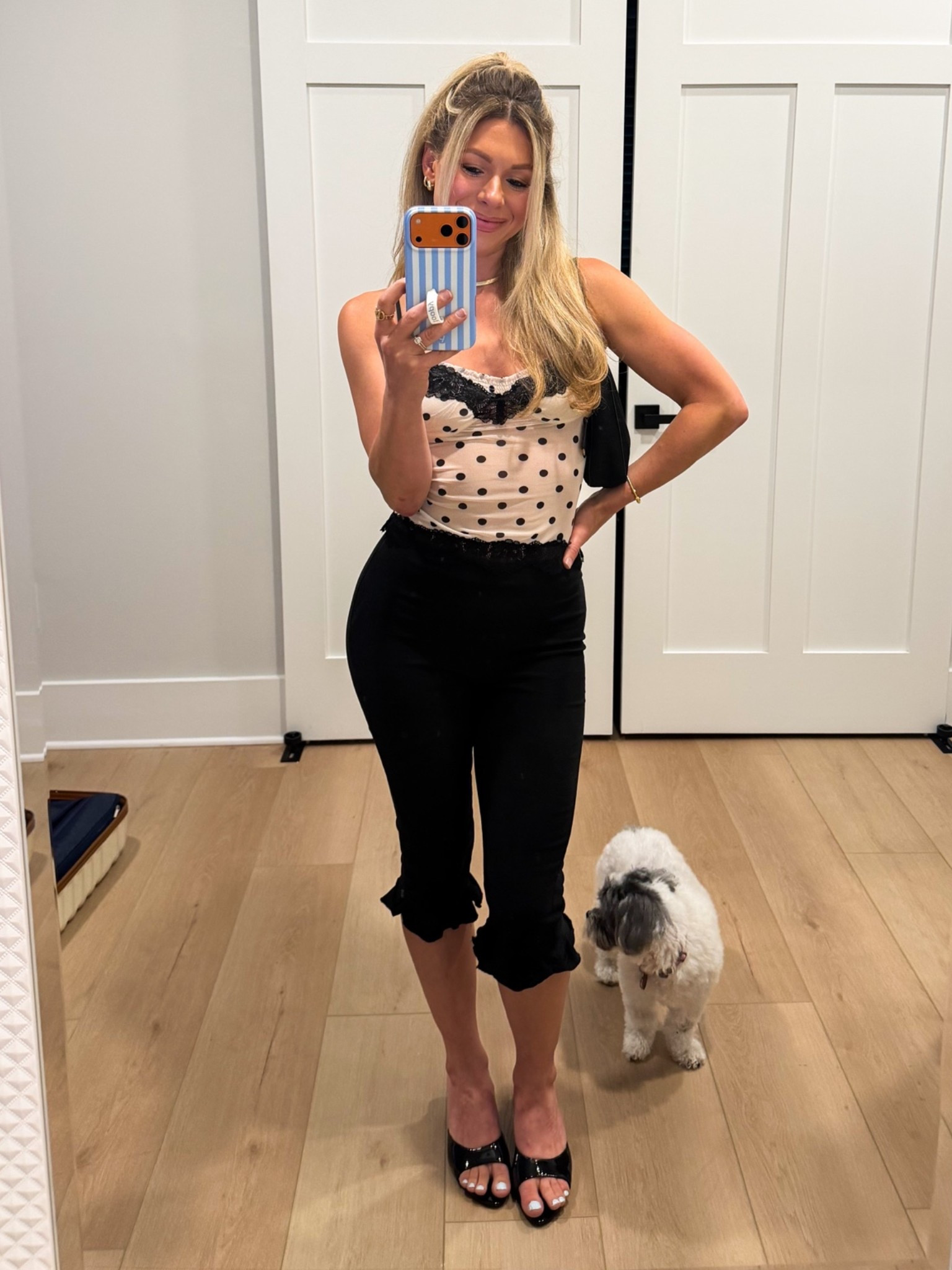 Black capri pants that look chic with a cute cami top

#LTKootd