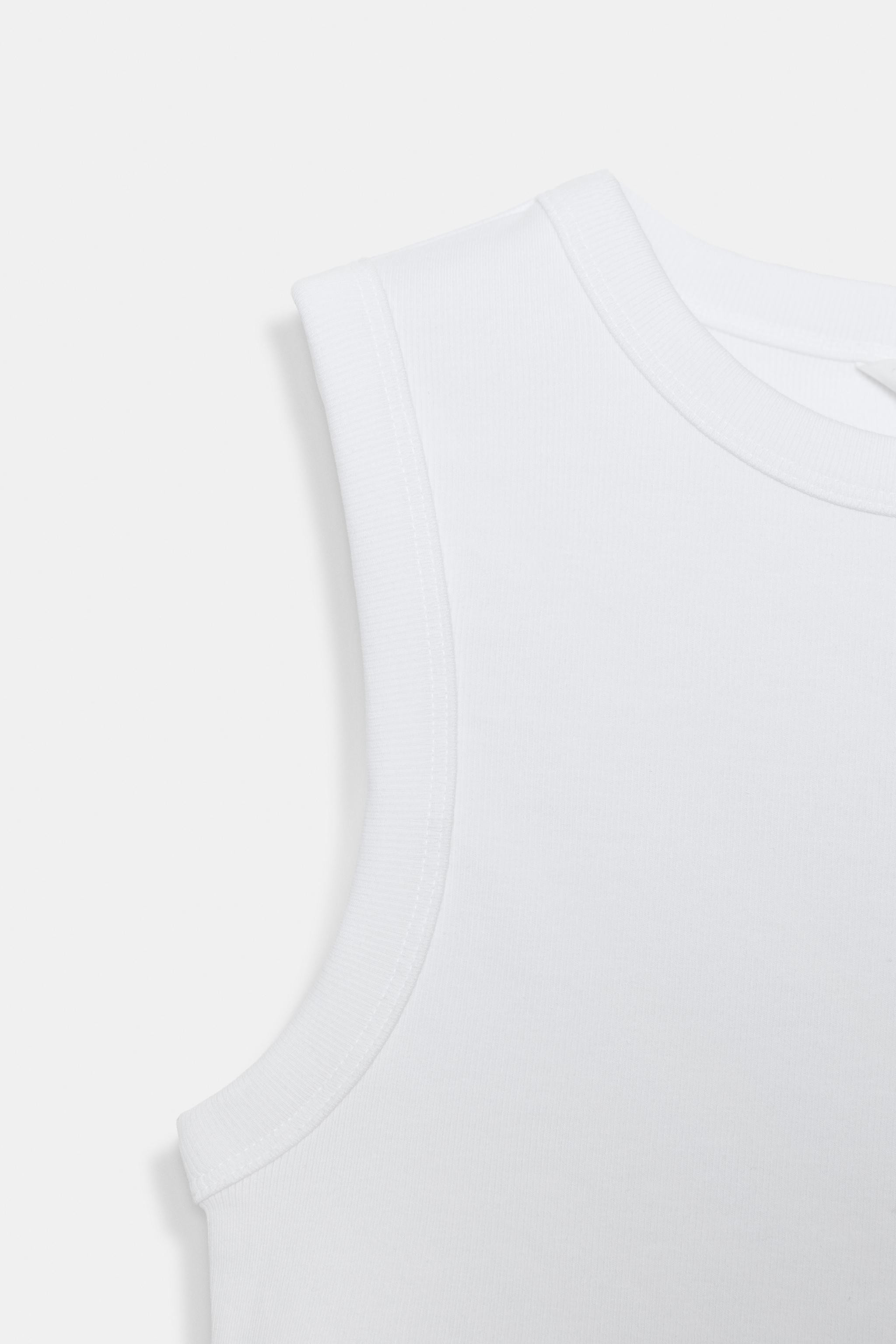 Model height: 175 cmTop made from yarn in a cotton blend. Round neck and straps. Ribbed trims. | Zara UK