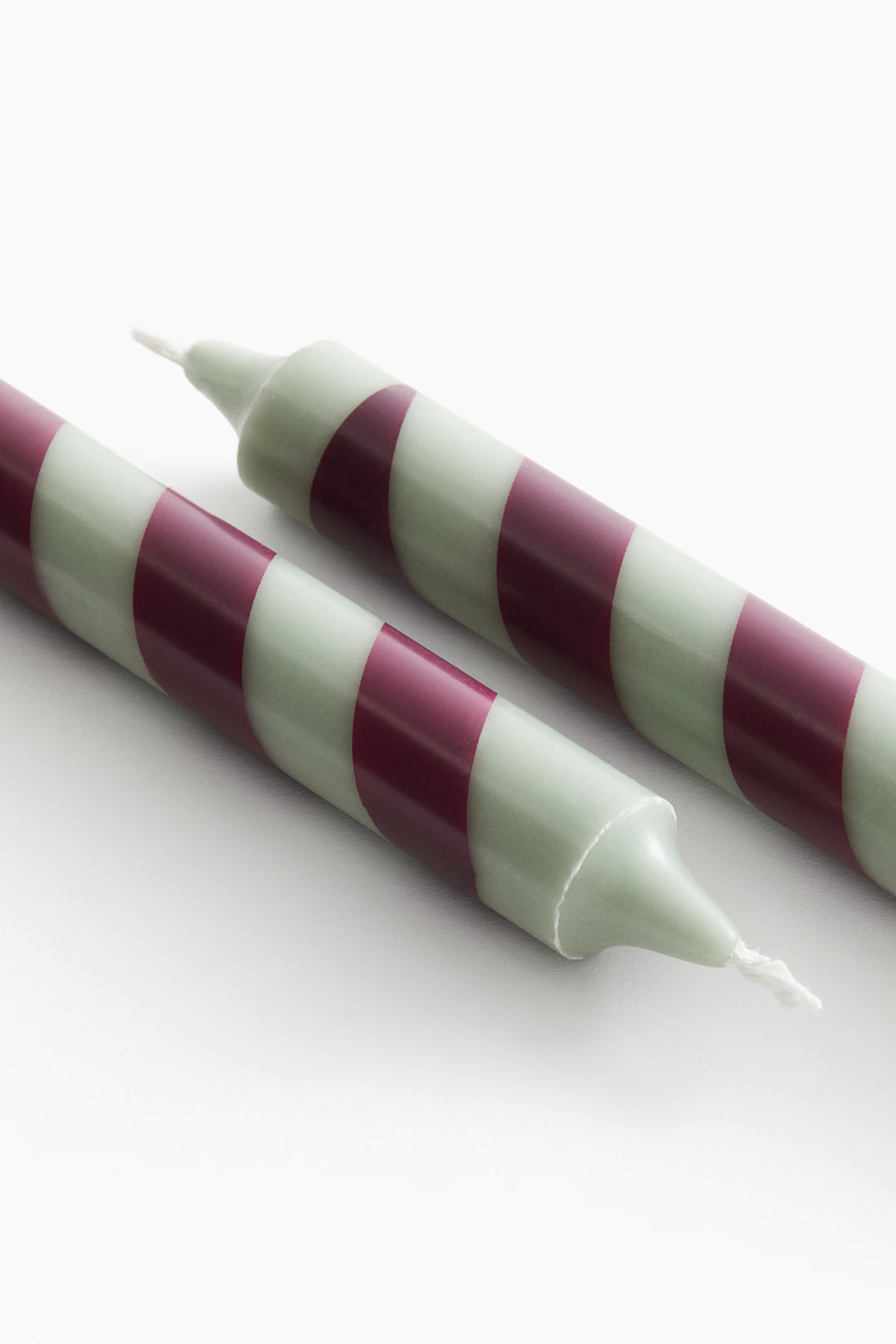 2-pack Candy Cane Candles | H&M (US + CA)