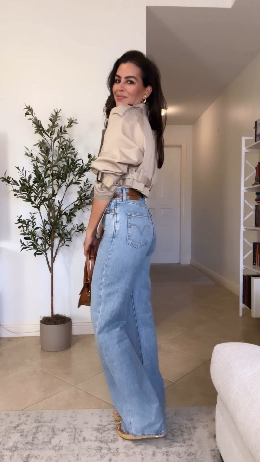 All sizing and details 👖👇🏼⬇️
-Size 25x 34 in the jeans. Available in 30, 32, & 34 length. Exact color  Far And Wide 
-Tshirt, size M.
-Cardigan size M. Runs oversized.
-shoes tts.
-size S in Cropped trench coat.
Adding similar tank top. 
@levi @jacquemus 

#LTKVideo 

#LTKHoliday #LTKGiftGuide

#LTKOver40 #LTKSeasonal #LTKTall