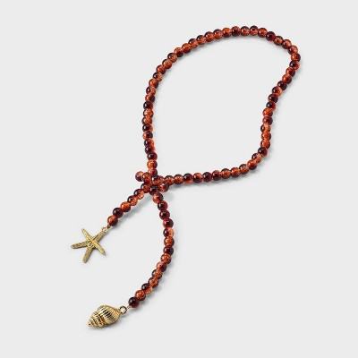 Starfish & Seashell Beaded Bag Charm - Universal Thread™ Brown | Target