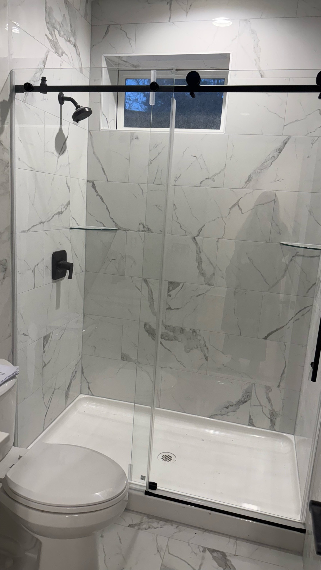 Renovations going strong! 
This sliding door from Amazon was exactly the shower door we were looking for- love the barn door style and slide feature.

#LTKHome #LTKdayinmylife #LTKgrwm