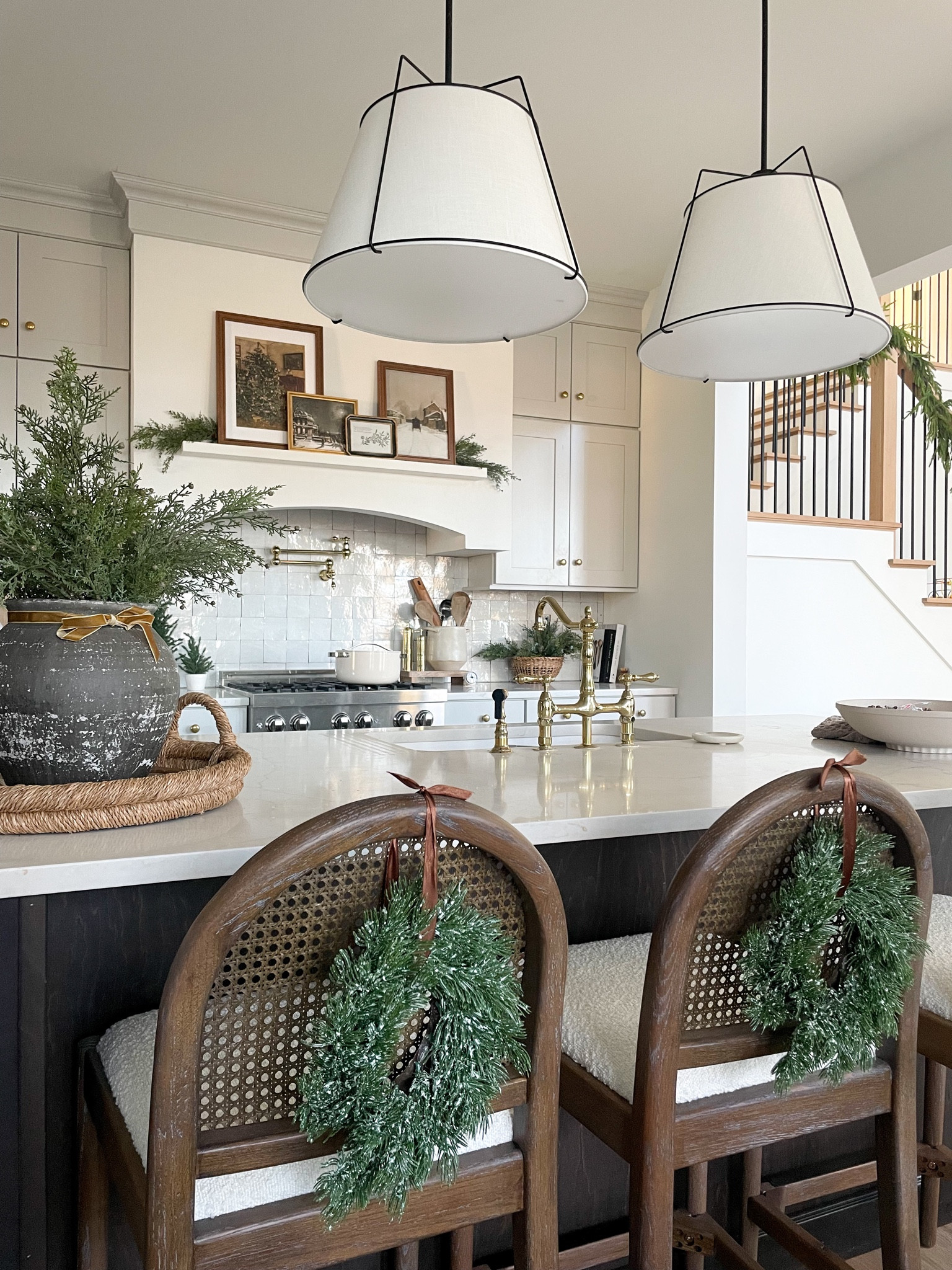 Shop the space ✨ 

Bar stools, kitchen, kitchen decor, frames, shelf styling, digital art, counter styling, island, counter, quartz, Christmas decor, Christmas kitchen, island seating, large vase, stems, garland, stair garland

#LTKhome #LTKfindsunder50 

#LTKSeasonal