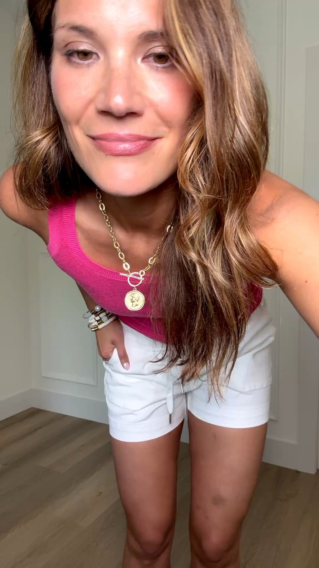 This bright pink tank and white shorts combo is such a fun and easy summer outfit for vacations, errands, beach days, or casual everyday wear. The bold color paired with crisp white shorts gives that effortless sporty summer look while still feeling flattering, lightweight, and comfortable for hot weather days.

Wearing a M

Pink summer top, White shorts outfit, Casual summer style, Everyday summer outfit, Vacation outfit ideas, Bright color fashion, Sporty casual look, Summer basics for women, StangandCo

#LTKootd #LTKSeasonal #LTKTall