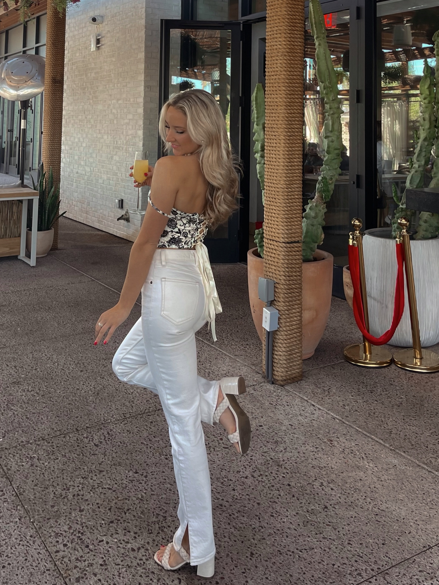Cream jeans, tie back corset top

#LTKstyletip #LTKFind #LTKSeasonal