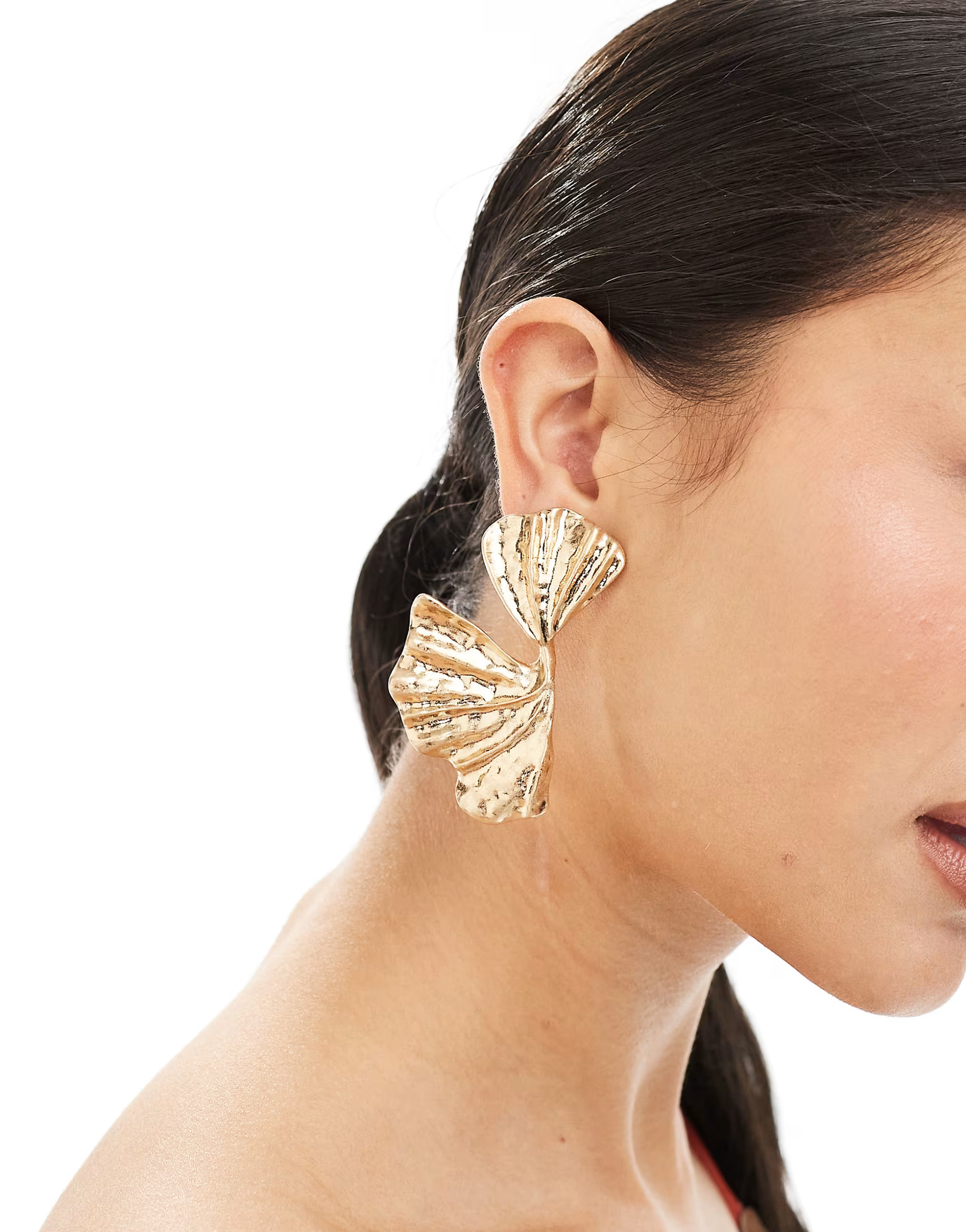 ASOS DESIGN stud earrings with twist petal detail | ASOS | ASOS (Global)