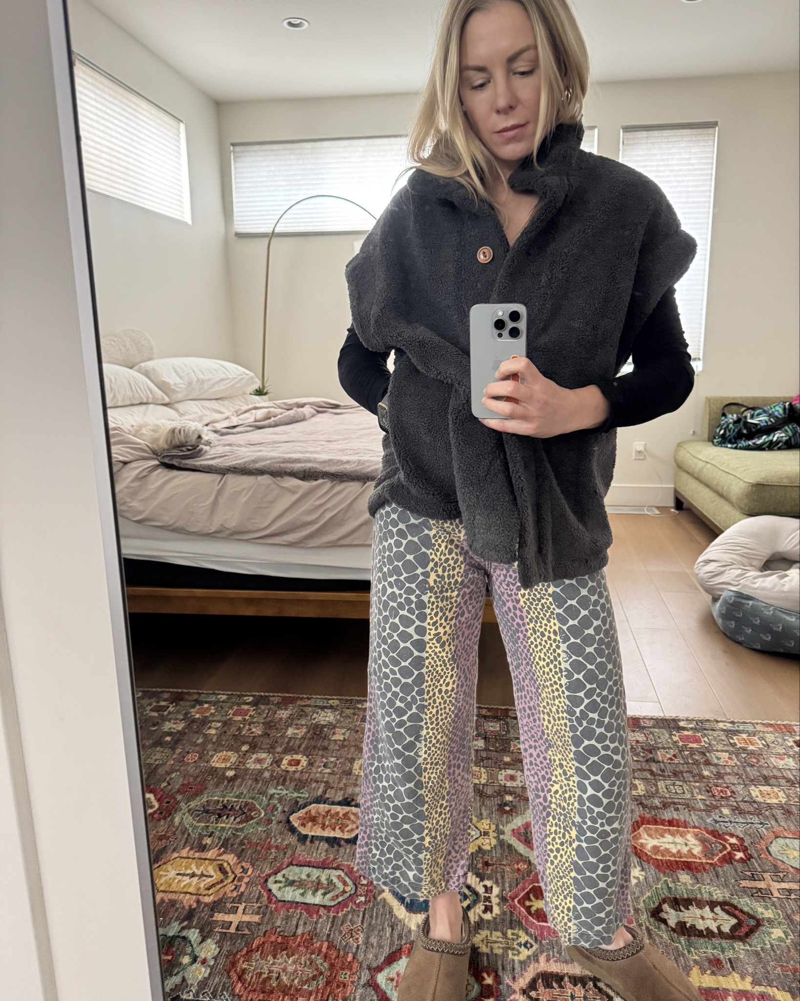 Obsessed with this vest. I have it in this color which is “black” but it’s more of a dark grey irl. I also have the cream color vest. It runs oversized so I’m eating a small vest. The pants I bought in South America but linked similar pair here. 