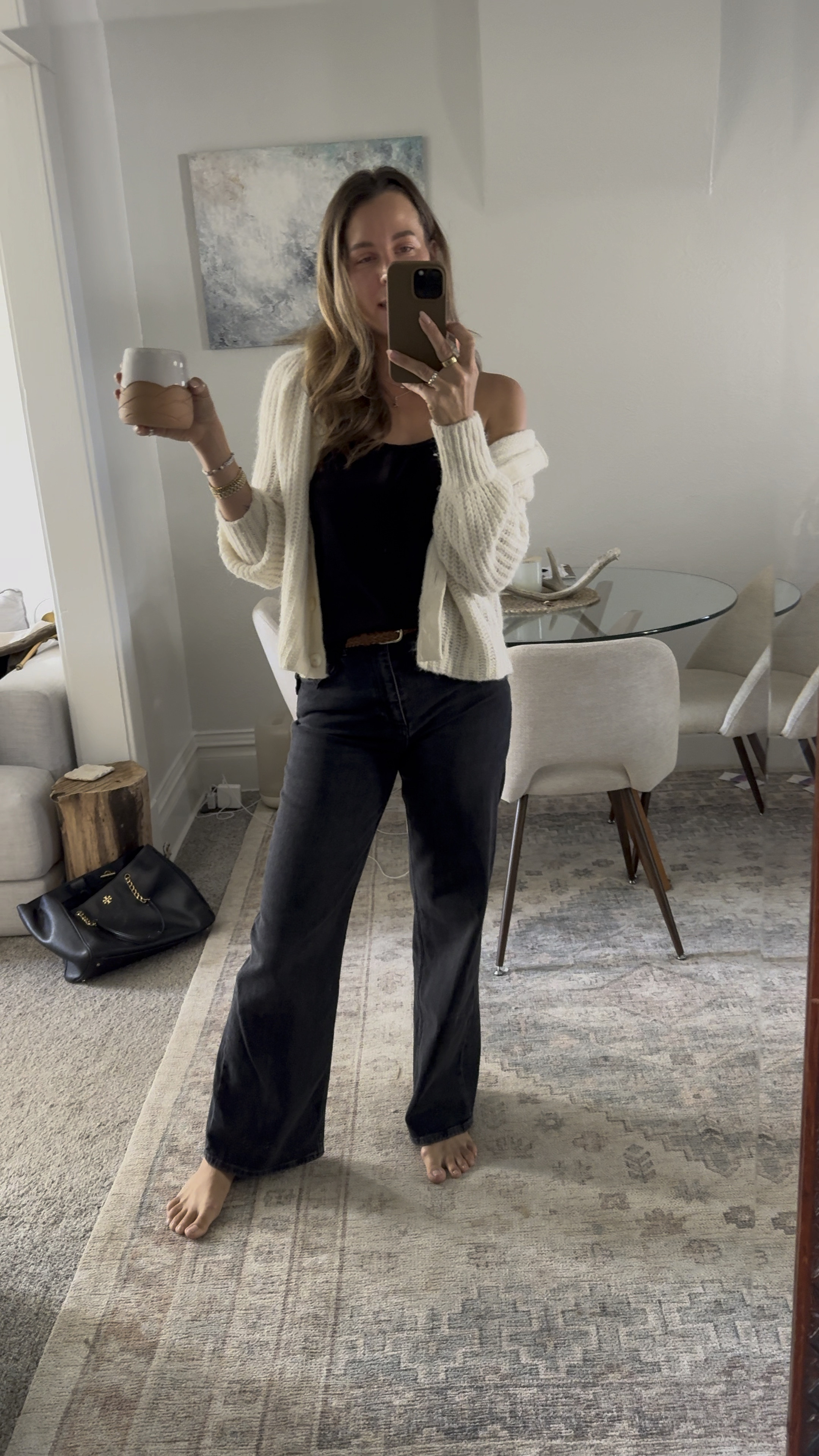 Sweater is small, jeans are 27