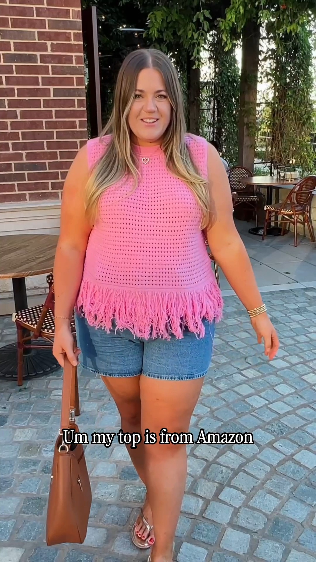 I’ve already worn this outfit a couple of times, including to my first time playing mahjong the other night, so she’s officially a favorite 💕 This pink fringe sleeveless sweater top is such a fun statement piece, but still easy to wear with classic denim shorts, a neutral shoulder bag, and simple everyday accessories. Perfect for a colorful summer outfit, midsize summer outfit idea, casual girls day look, mahjong night outfit, brunch outfit, vacation outfit, or an easy pink top and denim shorts outfit.

#LTKootd #LTKMidsize