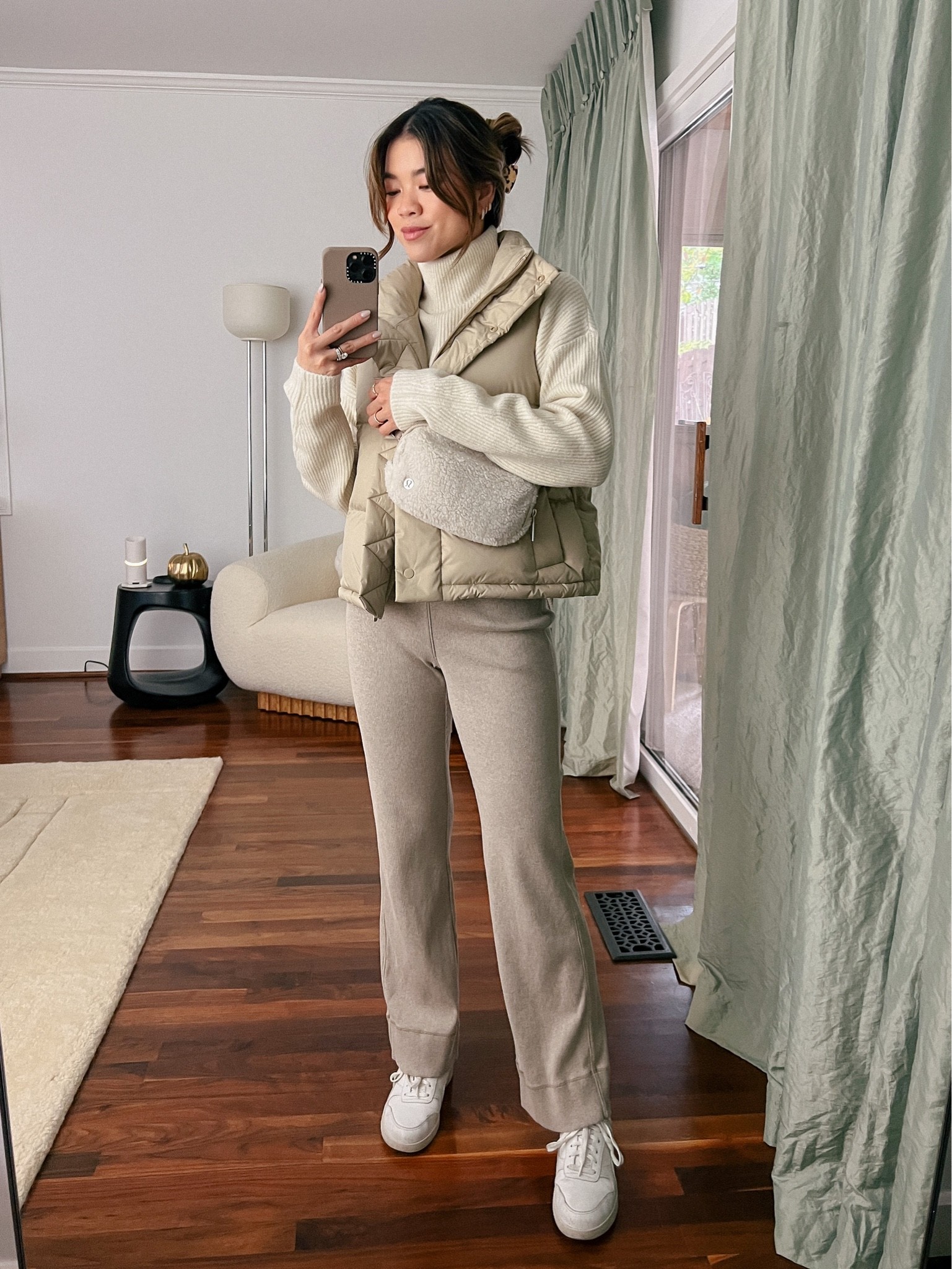 Lululemon puffer vest layered over an Abercrombie turtleneck sweater with cream knit pants and Everlane white sneakers!

#fall
#fallfashion
#fallstyle
#falloutfit
#winter
#winterfashion
#winterstyle
#winteroutfit
#puffervest
#lululemon
#everlane
#abercrombie 
#whitesneakers
#knitpants

#LTKSeasonal #LTKHoliday #LTKstyletip