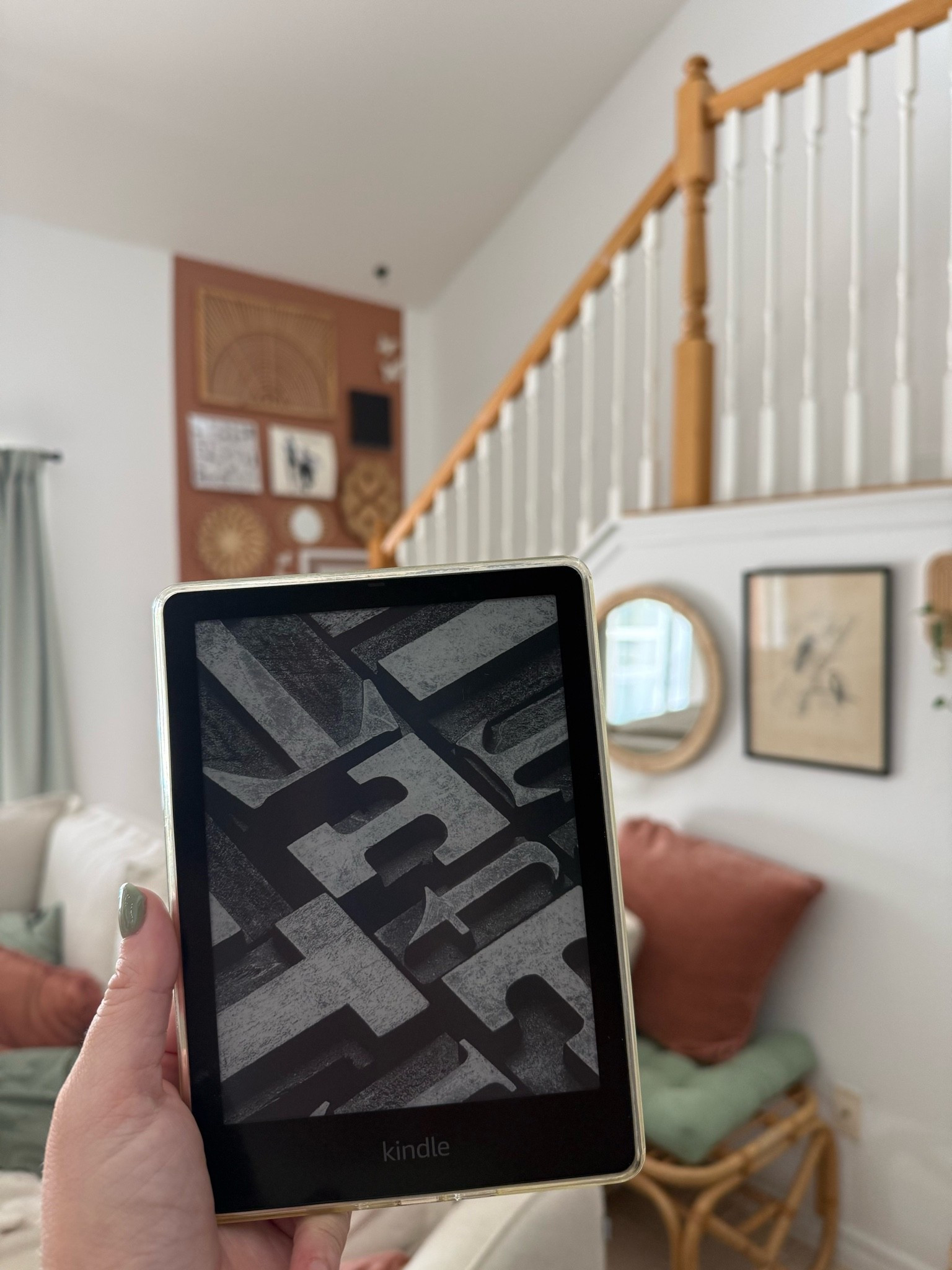 Amazon Kindle Paperwhite with a sage green back, I love it so much!