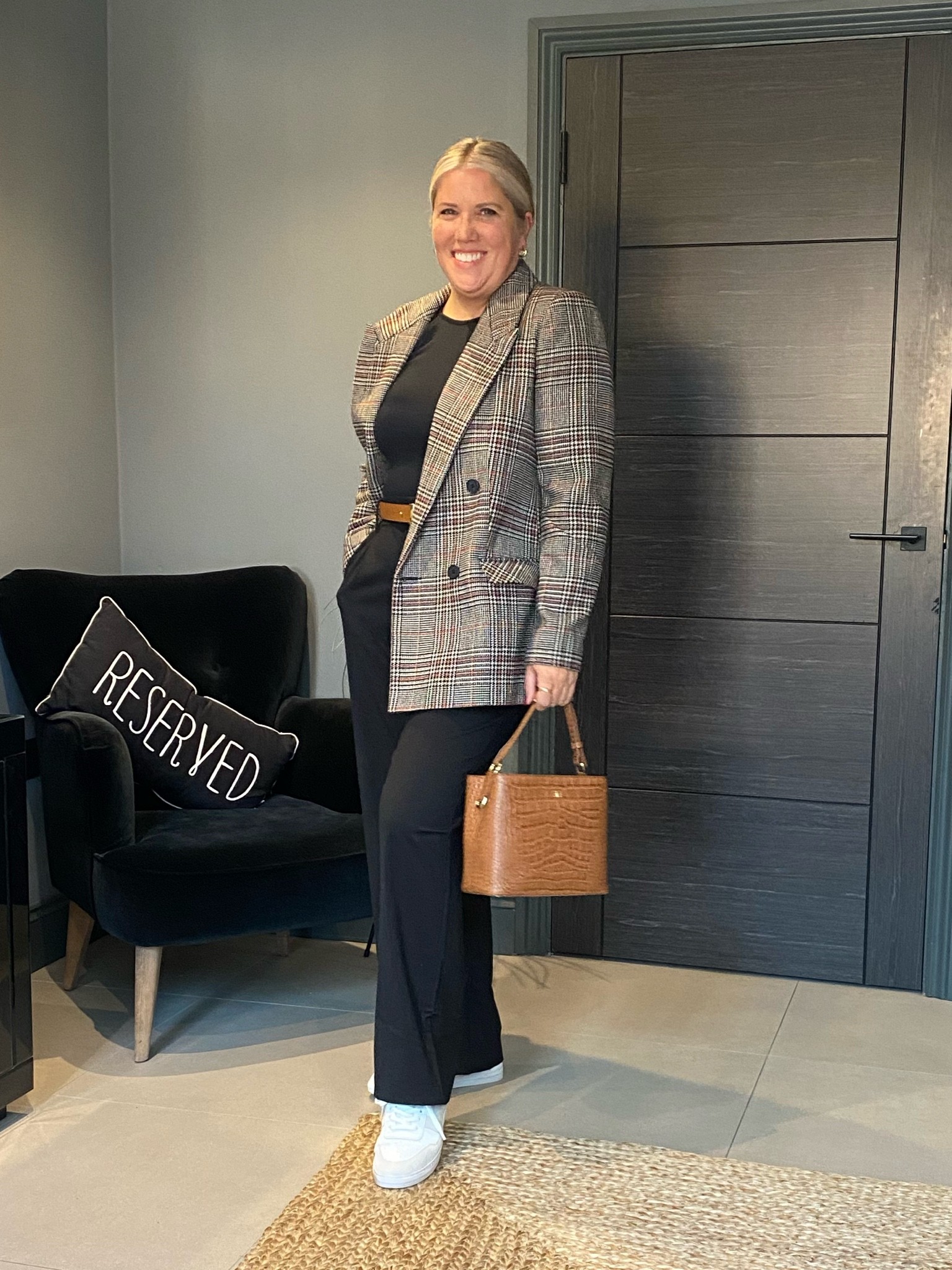 Easy smart casual outfit. Checked blazer, wide leg black trousers, black cut out top, trainers,

#LTKeurope #LTKstyletip #LTKSeasonal