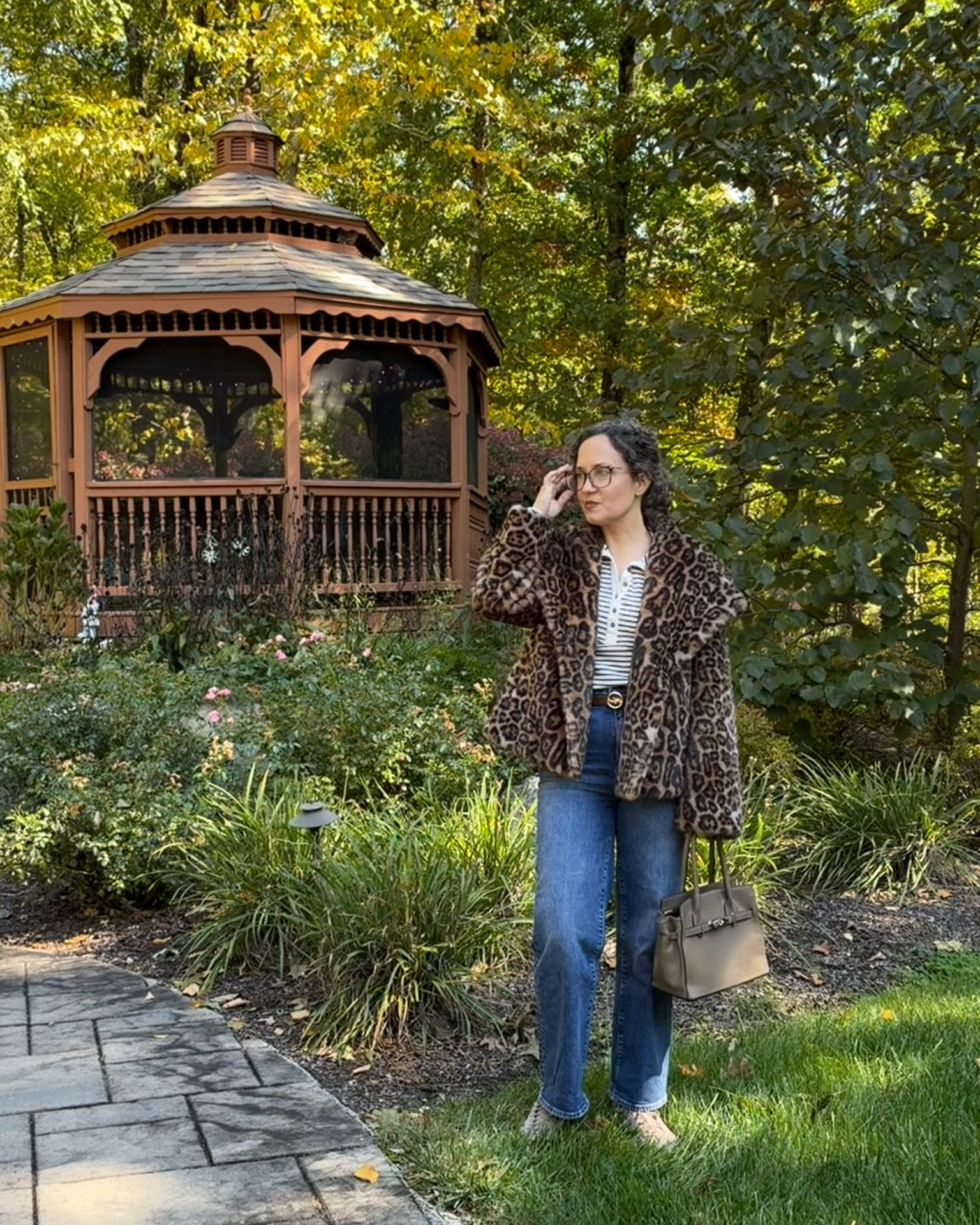 Two other ways I’m wearing this leopard statement coat; its Sam Edelman from Nordstrom. Stripe top from Free People, Frame jeans, Adidas sneakers. Midi denim skirt is from Nordstrom, knee high boots are Vince Camuto.
Bags are from Epcot 😝 and JW Pei.