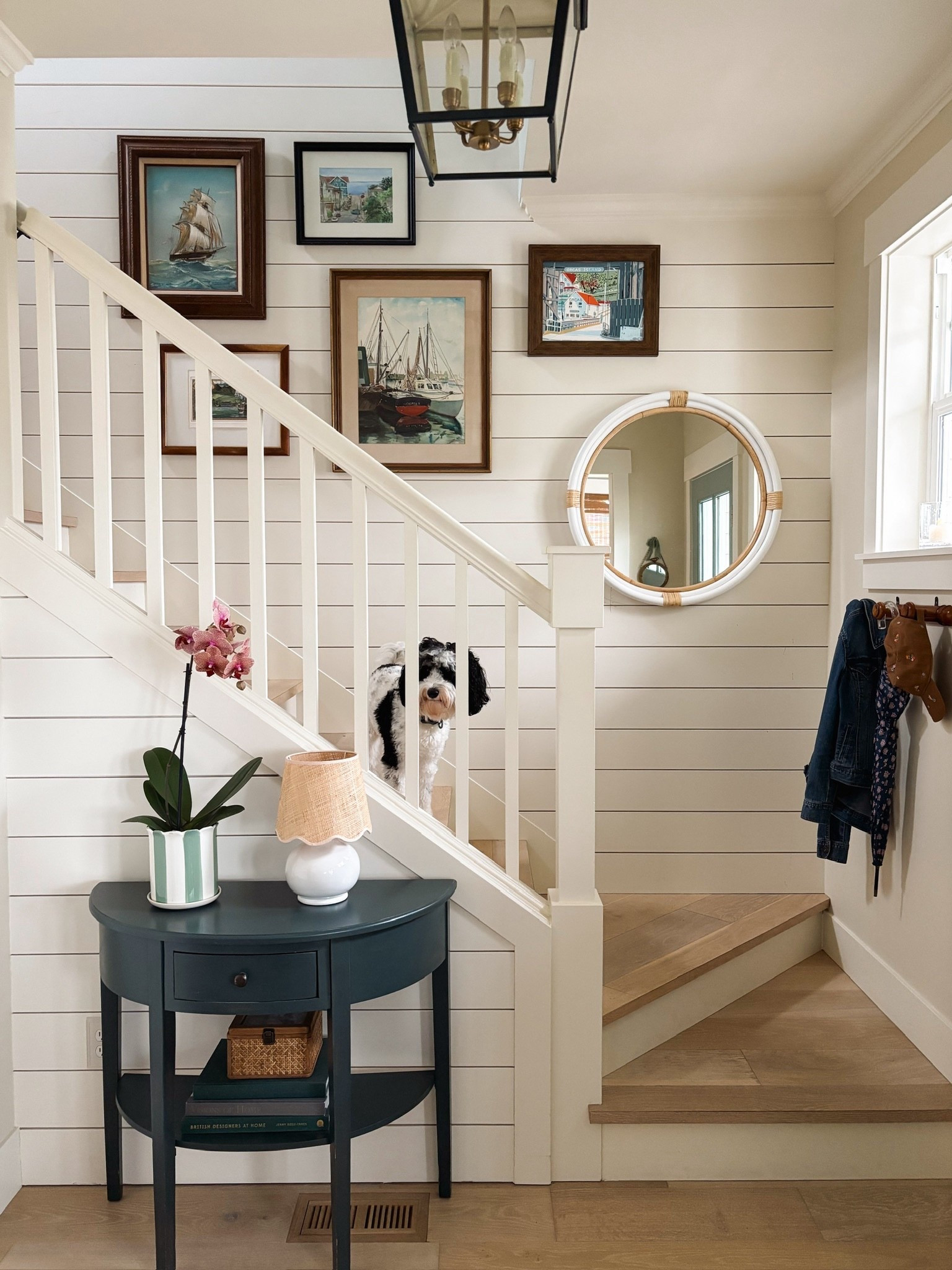 Entry sources - green white scalloped planter pot, demilune table, scalloped lamp, rattan mirror, faux tulips in brass door knocker basket 

#LTKSaleAlert #LTKSeasonal #LTKHome
