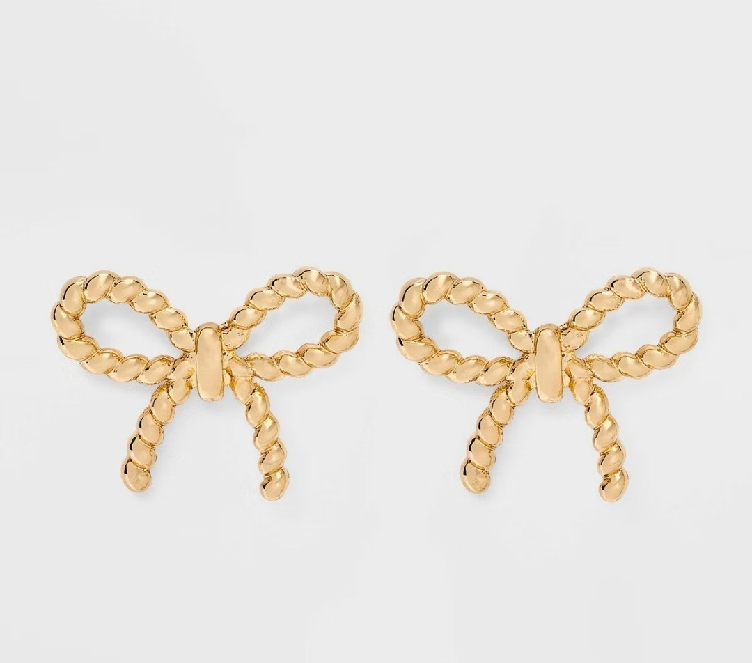 Simple Bow Earrings - A New Day™ GoldFit & styleBow-shaped earringsGold-tone finishMade from nickel-free metalPostback closures

#LTKootd #LTKHome #LTKBeauty