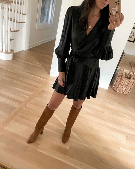 Kat Jamieson of With Love From Kat wears a fall outfit. Black dress, mini dress, brown boots, gold necklace, fall style, neutral outfit. 

#LTKstyletip #LTKshoecrush