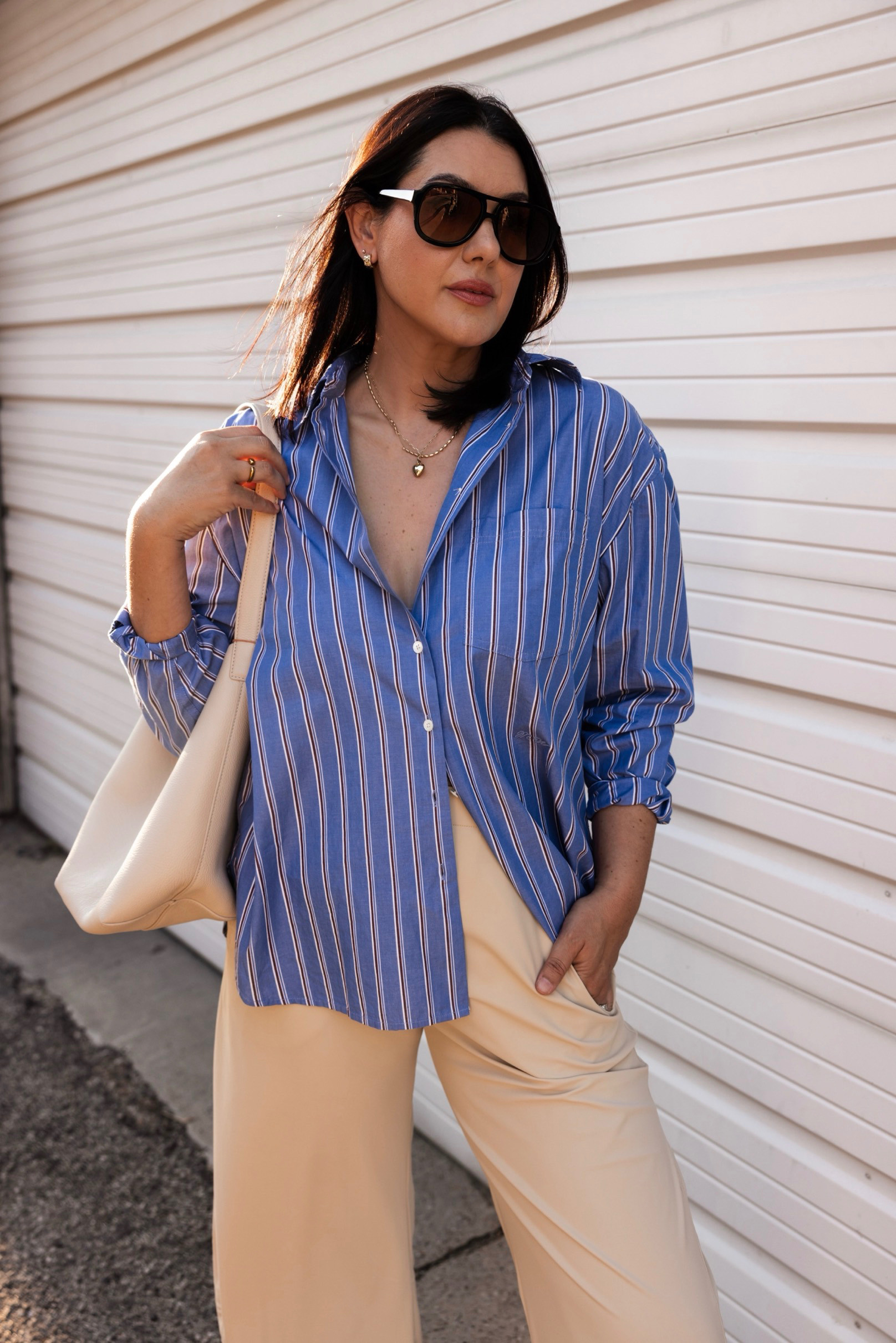 These are the ruti barrel dupes! I love this pair -- highly recommend. I'm in the large but they run big! If in between sizes, go down a size. 

I'm in the large of the poplin top, it runs loose / oversized.  

 