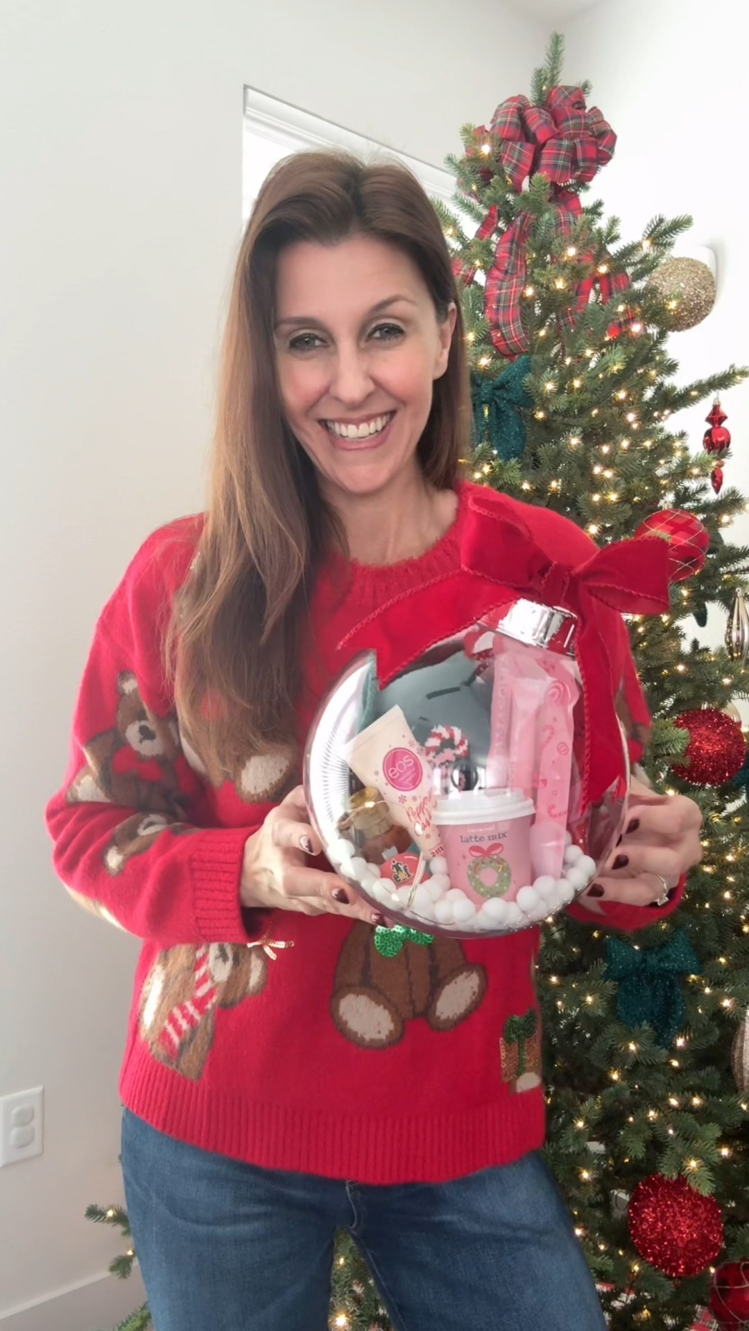 
I’m obsessed with this giant ornament gift idea! 🎄🎀
I filled this giant ornament with twinkle lights, white pompoms (for a snow effect), some super cute cozy gifts, and or course I topped it with a bow! 
This is perfect for gifting your besties, mom, sister, and teachers! I LOVE how it turned out and it was so fun and easy to make! 
This is probably one of the cutest gifts I’ve made. What do you think?! 

#LTKGiftGuide #LTKHoliday
