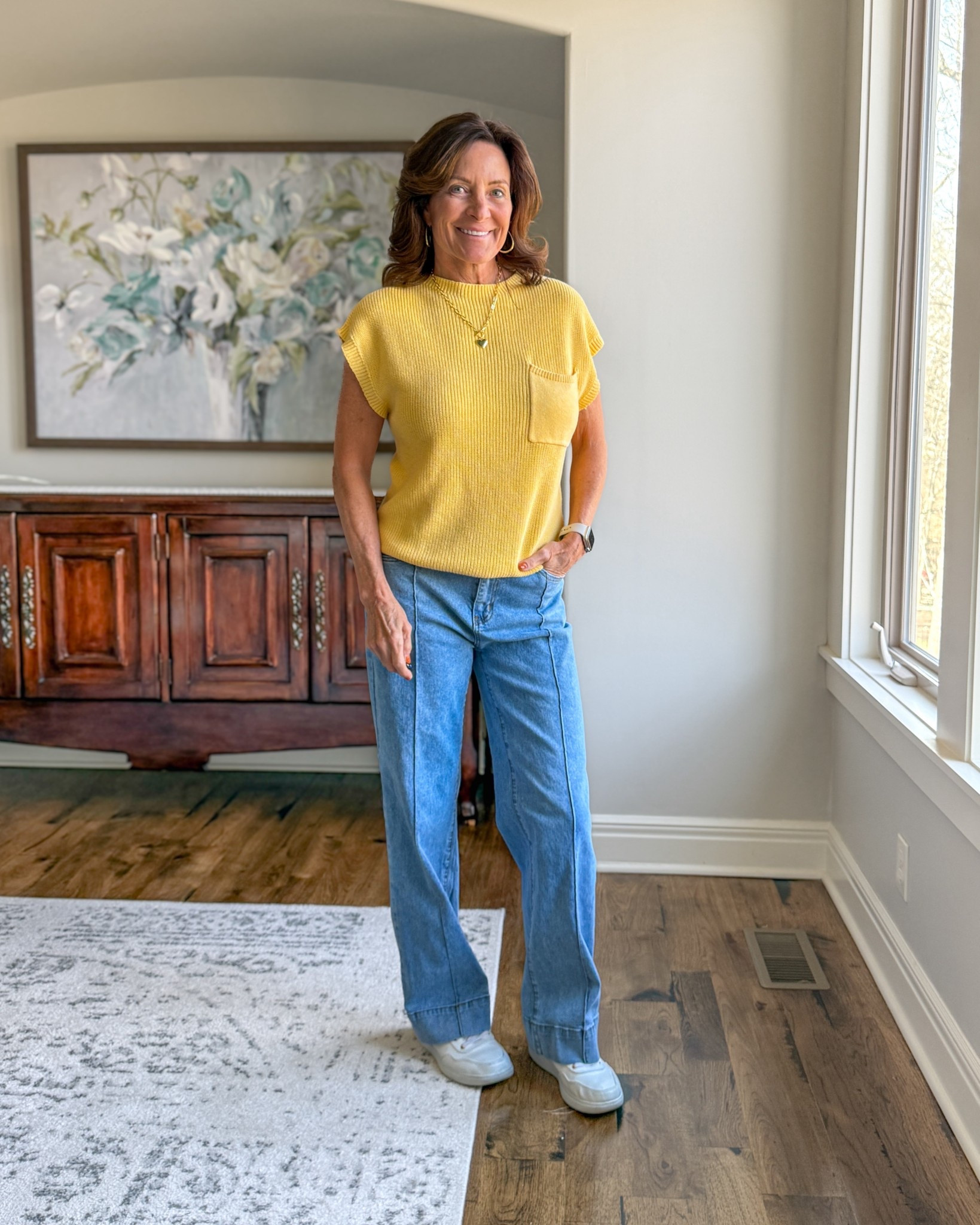 Casual Spring Outfit with Wide Leg Jeans

Spring outfit idea for women over 40 featuring wide leg jeans and a lightweight yellow knit top.

This is one of those effortless combinations that always works — soft knit cap sleeve sweater + flattering high-rise wide leg jeans + clean white sneakers. Easy for travel days, errands, or casual lunch.

Simple. Polished. Comfortable.



#LTKgrwm #LTKootd