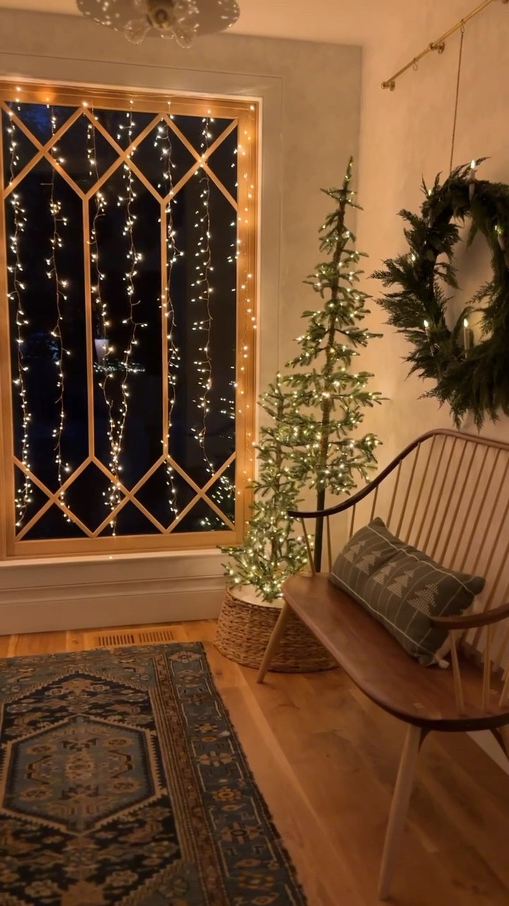 I like to ease into holiday decorating. First up? Twinkle lights and greenery. I grabbed these curtain lights from Terrain and paired them with two sweet, simple trees that I already had (also from Terrain). Added a wreath, too, and now our entry feels totally ready for Christmas. Thanks to Terrain, my new one-stop Christmas shop, for making decking the halls so easy this year :) #shopterrain #ad

#LTKHoliday #LTKVideo #LTKhome