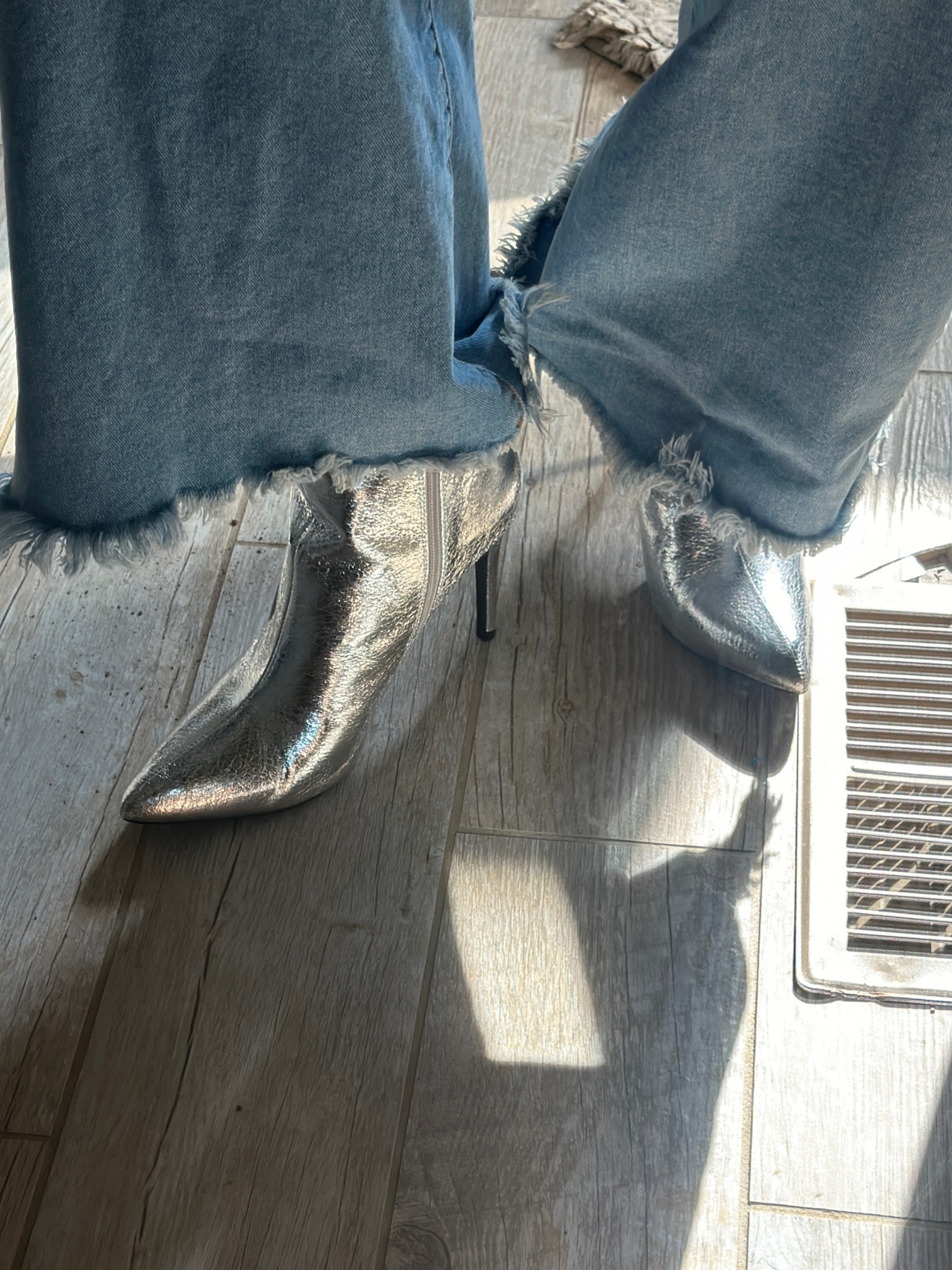 Silver stiletto booties 

#nfrinspo 
#rodeofashion #holidayoutfit 

#LTKShoeCrush #LTKSeasonal