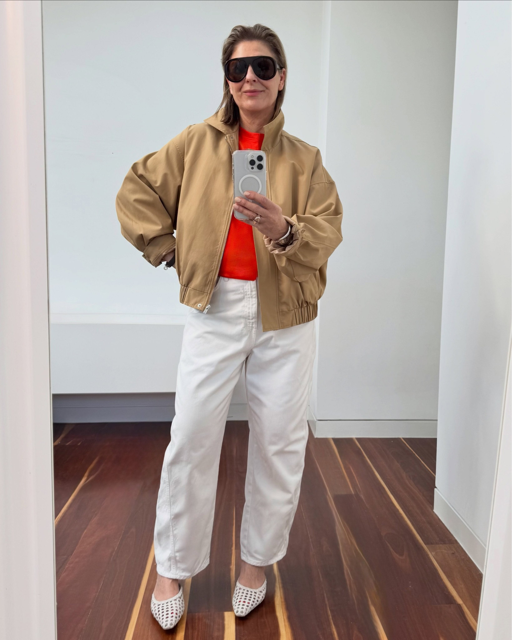 Do you remember this bomber jacket @theiconicau ?
Decided it was just the thing to toss over my new orange tank which I nabbed this month @lululemonausnz .

Pulled on my favorite white barrel jeans @zara as I’m loving this pop of colour back with camel and white. 
It works don’t you think ?! 

Adding a pop of red or orange is a simple way to joosh up your neutrals without - you know - going nuts with full on colour haha , just a little soupçon is enough for me !

#LTKover50style #LTKaustralia #LTKstyletip