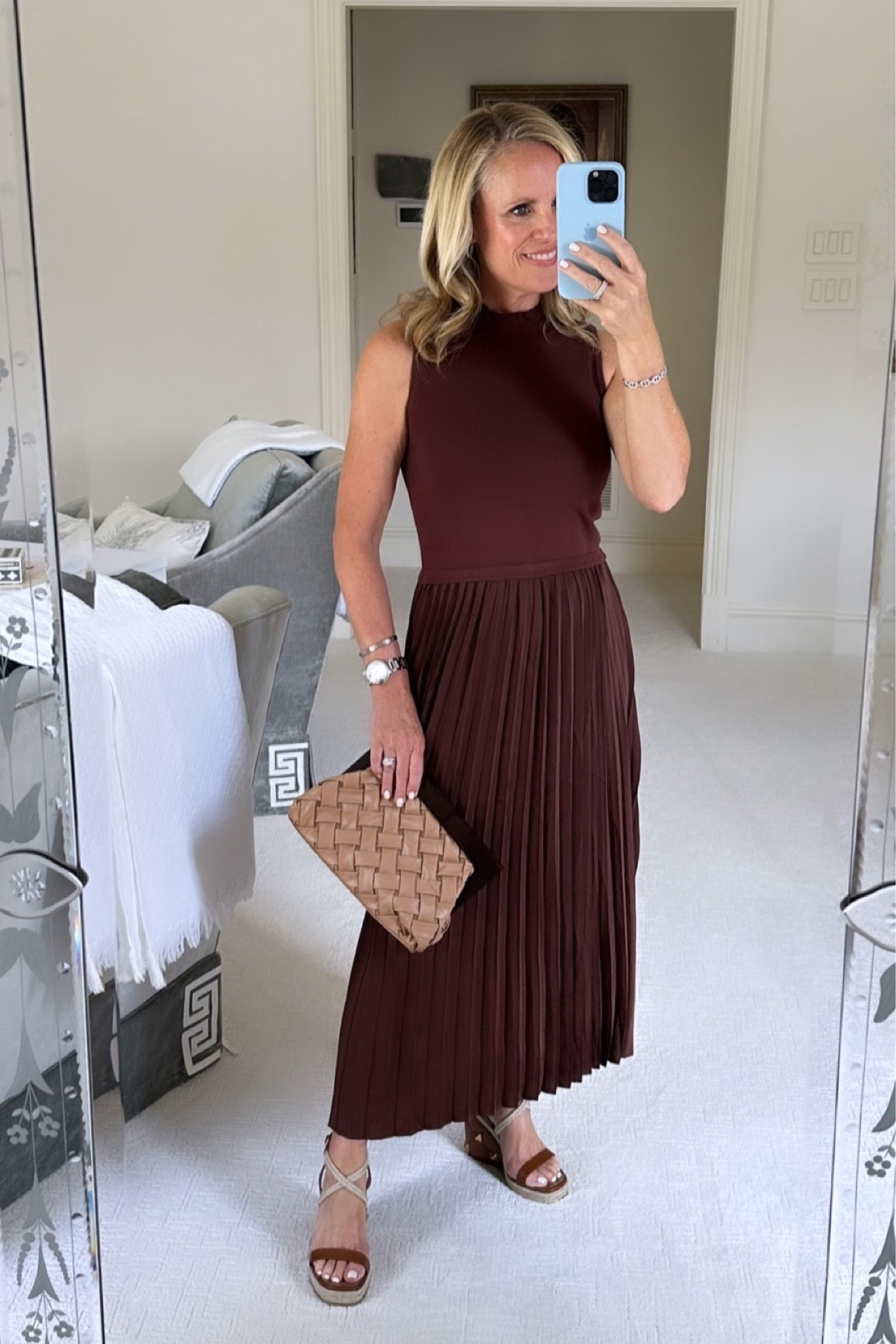 The perfect sweater dress for early fall

Chocolate brown sleeveless sweater, dress with accordion pleat silk skirt 
Fits true to size I’m wearing extra small 
Under $100

#LTKwedding #LTKfindsunder100 #LTKSeasonal