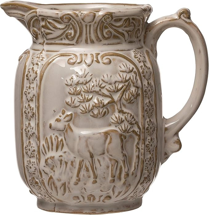 Creative Co-Op 6" L x 4-3/4"W x 6-1/4"H 28 oz. Embossed Stoneware Pitcher w/Deer, Reactive Glaze,... | Amazon (US)
