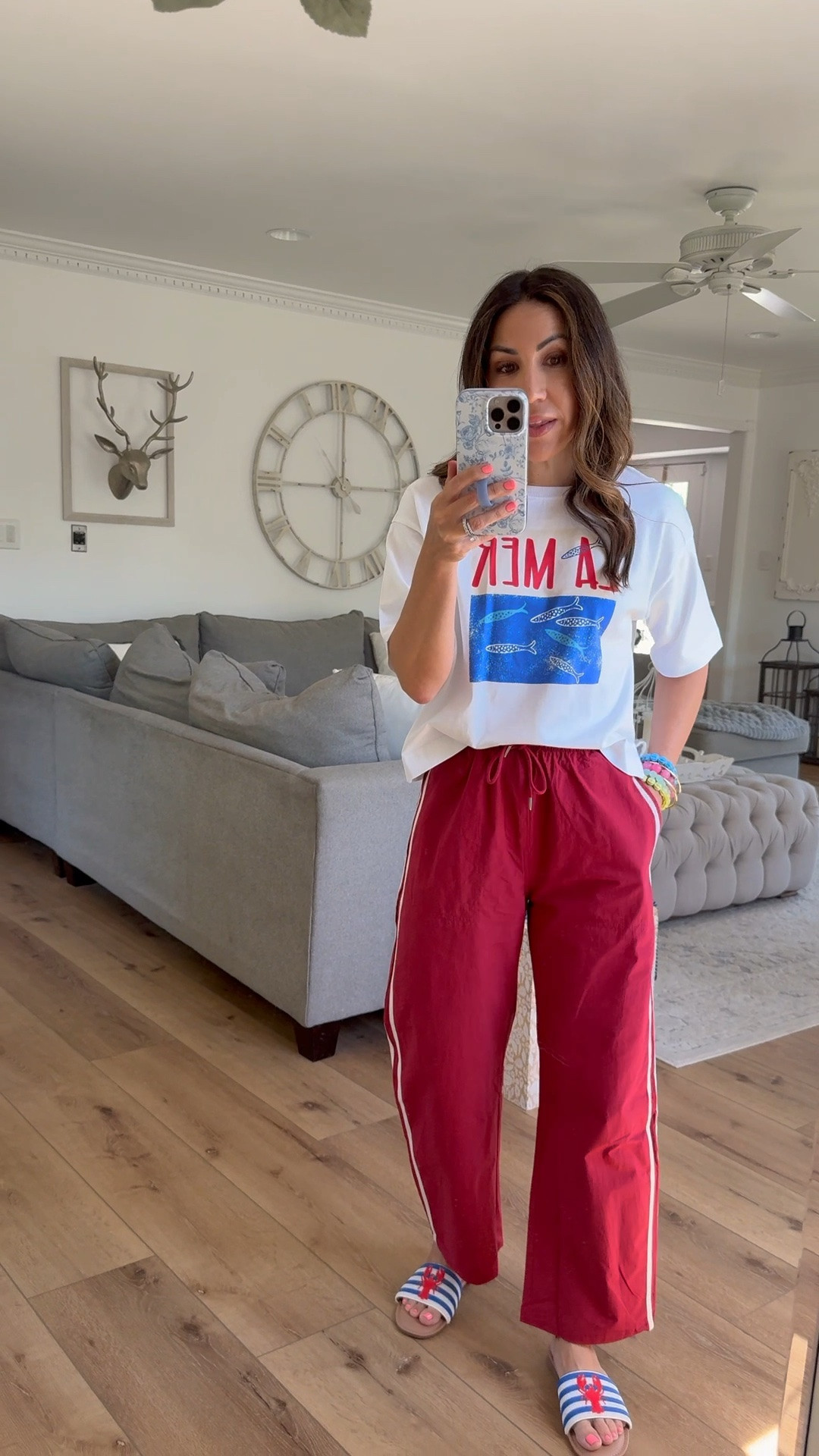 Xs red track pants. XS graphic T-shirt. Sandals TTS.

#LTKOver40 #LTKSaleAlert #LTKPetite