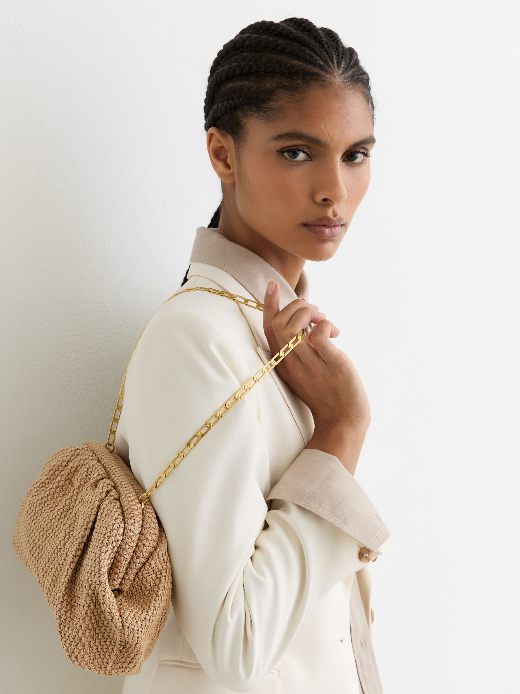 Reiss Raffia-Effect Ruched Clutch Bag in Natural - REISS | Reiss UK