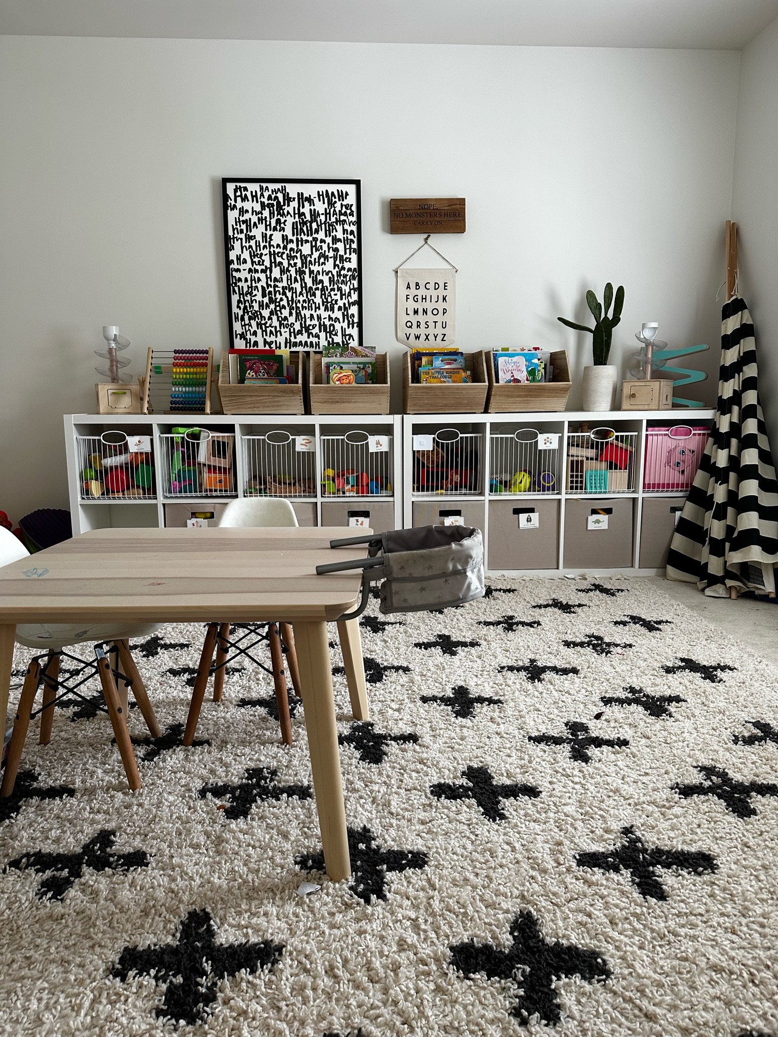 our playroom and storage solutions! 📦

we have 2 of the 6 cube storage laid on their sides next to eachother! then did wire baskets on top and fabric ones on bottom (they’re still sturdy and hold their shape!). wood book holders on top!

#LTKFamily #LTKHome #LTKKids