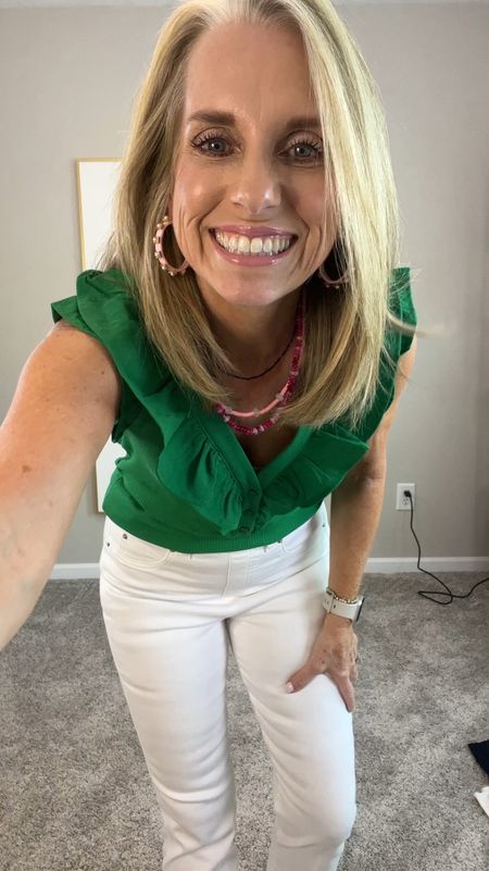 I’m loving green for spring and summer and this top is so cute. I have it in black also. Wearing XS (code LISA10)

Spanx kick flare jeans. These are supposed to be a little cropped but I’m in a regular and they’re a normal length. I’m 5’3. Wearing small. Use code LISAXSPANX 

New jewelry from Allie +Bess. Use code COAST20 for 20% off 

#LTKworkwear #LTKover40 #LTKfindsunder100