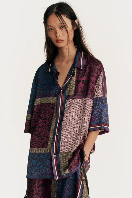Relaxed fit shirt made of flowing viscose fabric with contrasting mixed prints. Features a camp c... | Zara IT