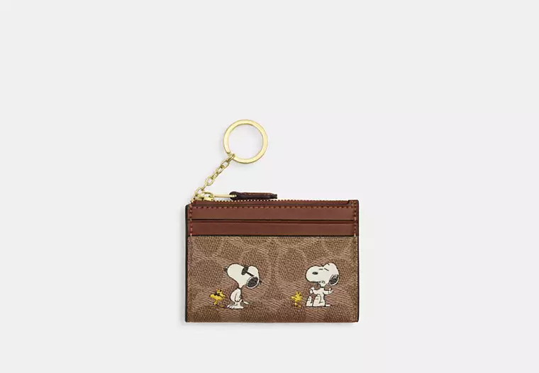 Coach X Peanuts Mini Skinny Id Case In Signature Canvas With Snoopy Print | Coach Outlet US