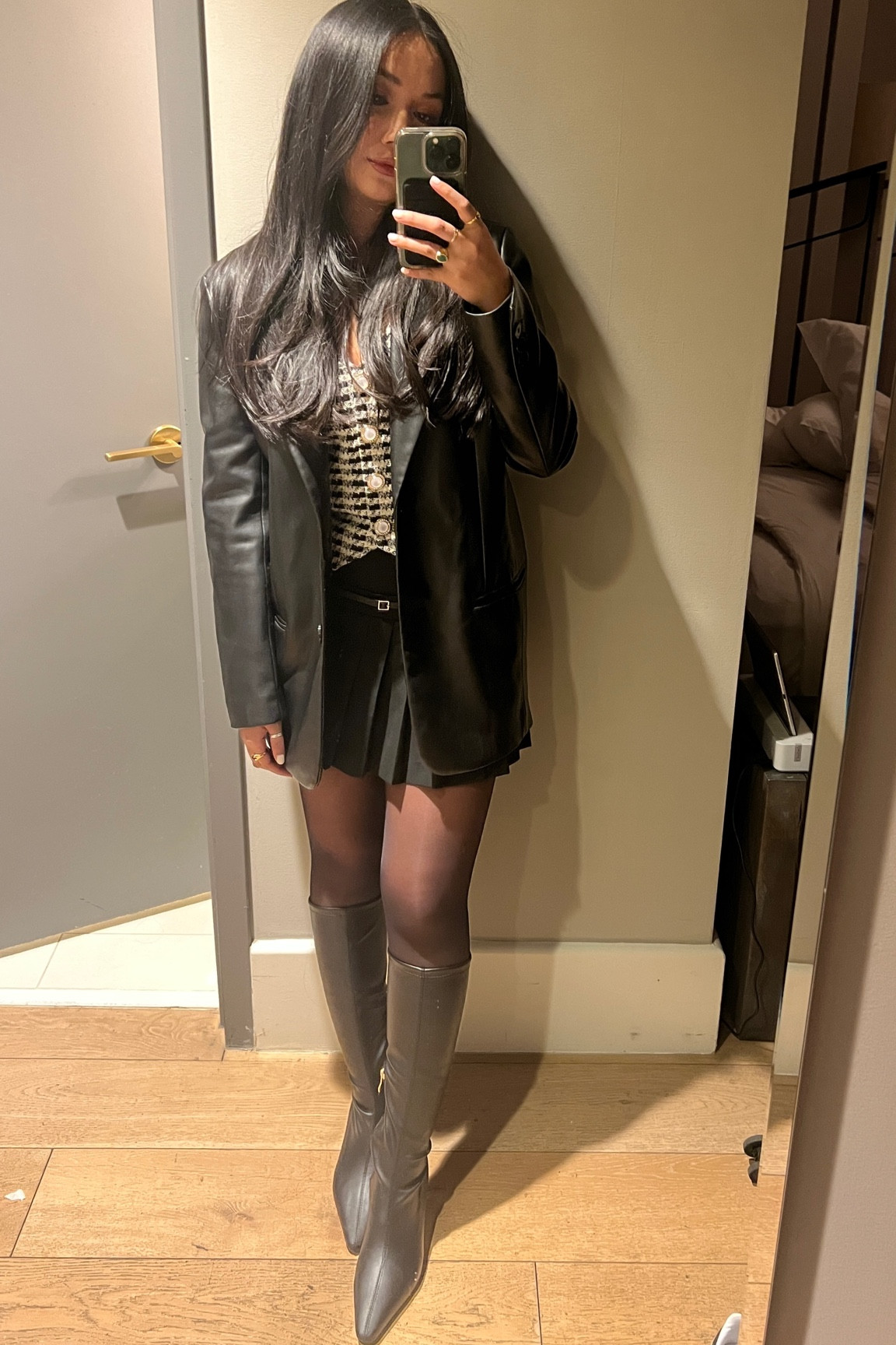 black pleated skirt with tweed vest and black leather blazer with knee high boots 

#LTKstyletip #LTKfindsunder100 #LTKshoecrush
