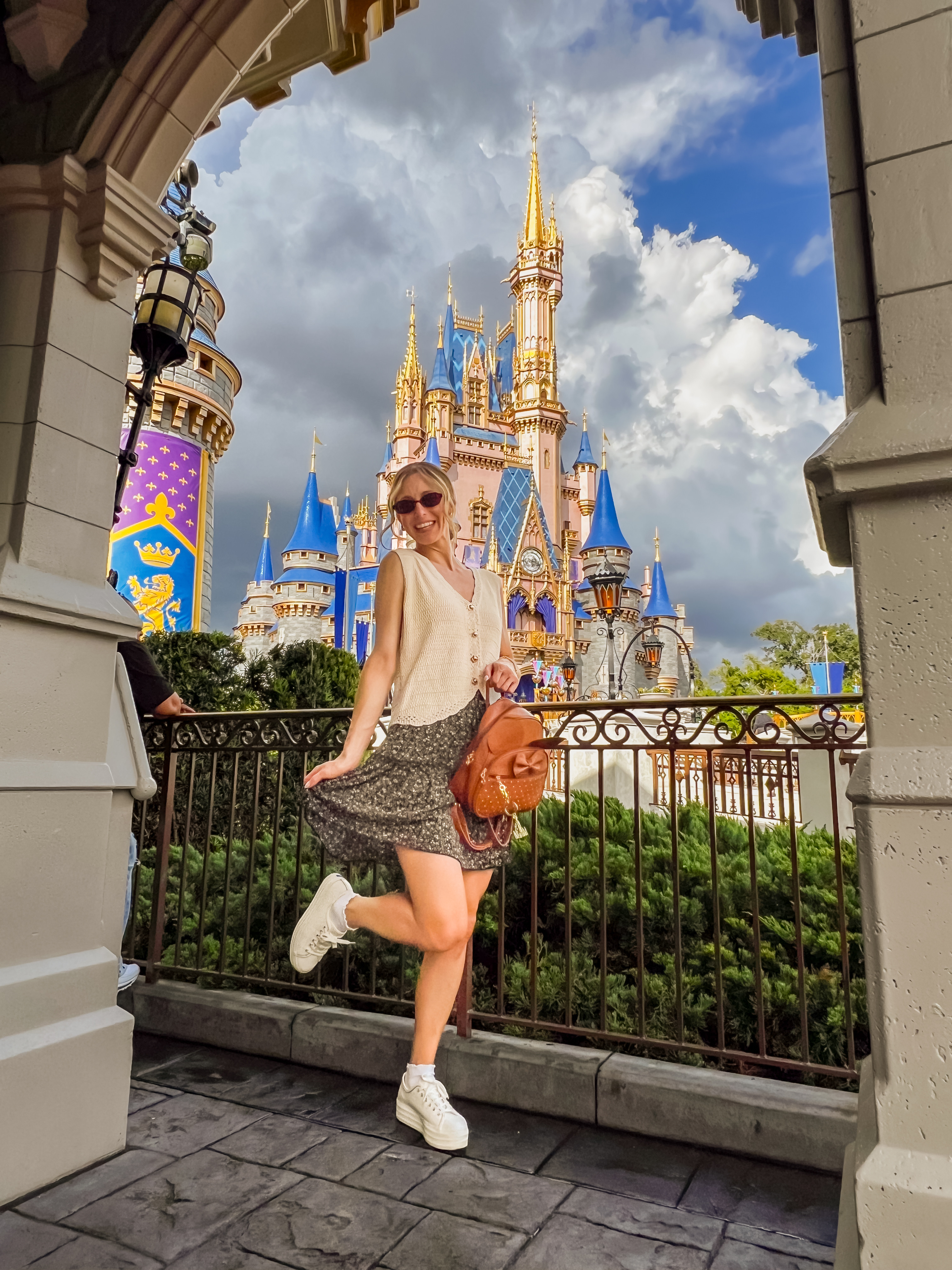 Having a magical day at Disney! Loving this flowy skirt and comfy sneaker combo. Perfect for a day of adventures. I paired it with a cute bracelet and sunglasses. The platform Keds were comfortable enough to walk all around the park in!

>I'm wearing a size medium in the knit vest.
>Keds sneakers fit TTS.
 

 #LTKootd #LTKSeasonal #LTKOver40