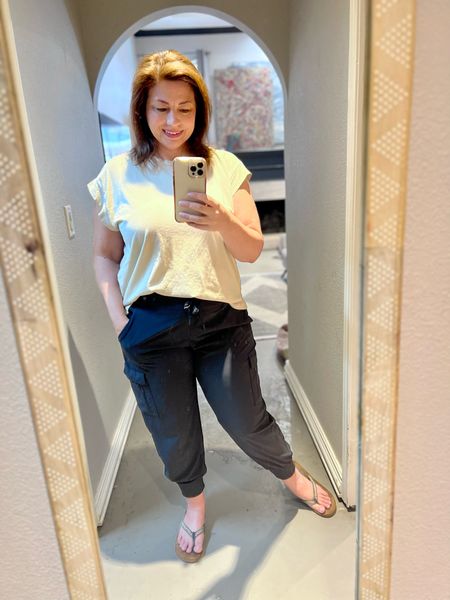 Love these “parachute pants” for the summer.  They are a lightweight breathable cargo style pant with a stretchy waistband.  So comfy!  They are cute paired with this sleeveless top and flip flops.  Perfect for when you don’t want to wear shorts, but you don’t want to be hot.

#LTKcurves #LTKunder50 #LTKSeasonal