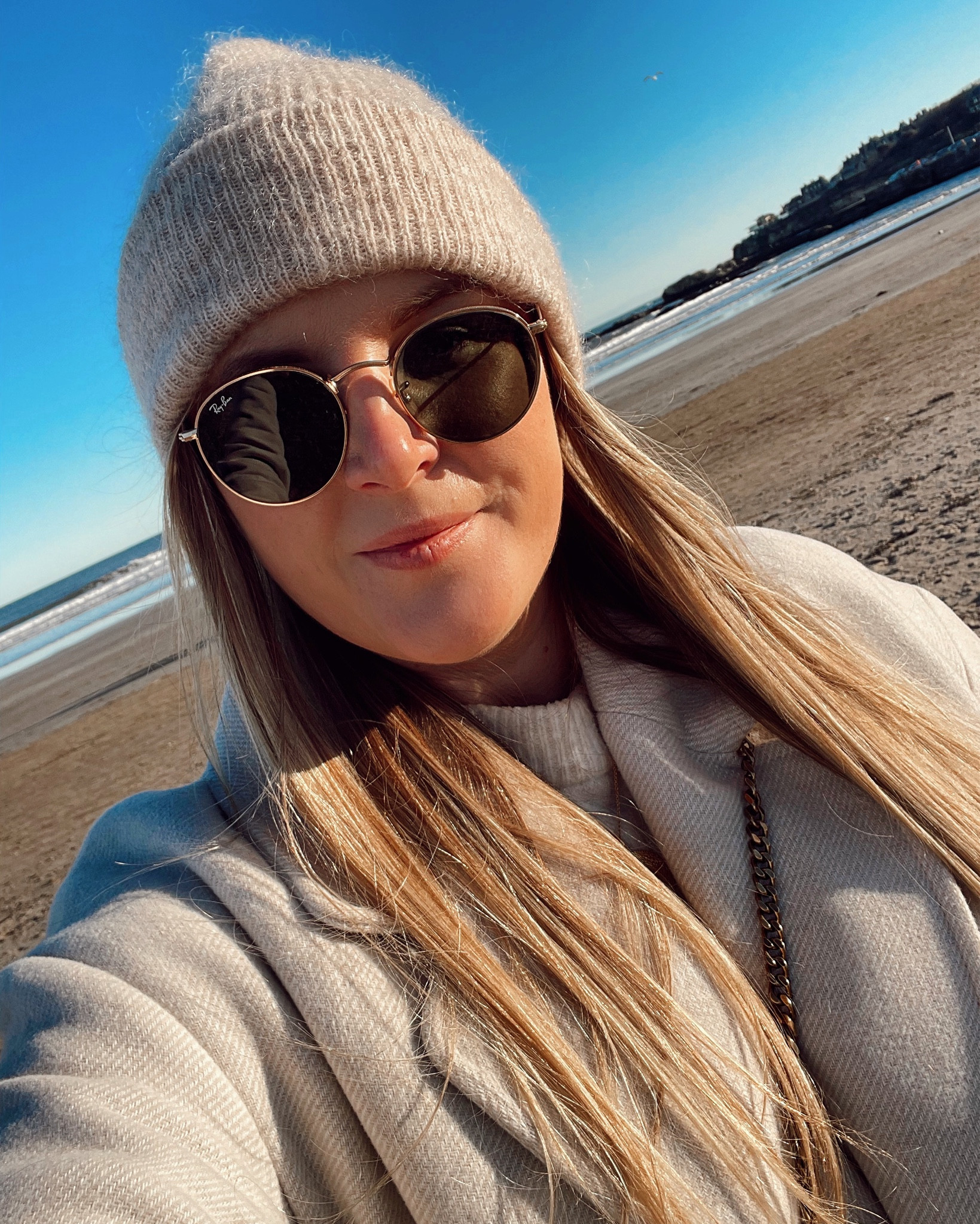 Cosy winter neutral beige outfit with beige beanie and rayban round sunglasses and cream oversized H&M coat! Minimal outfit

#LTKeurope #LTKSeasonal #LTKunder50