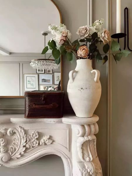 living room mantle on sale and spring florals with vase 

#LTKSeasonal #LTKsalealert #LTKhome