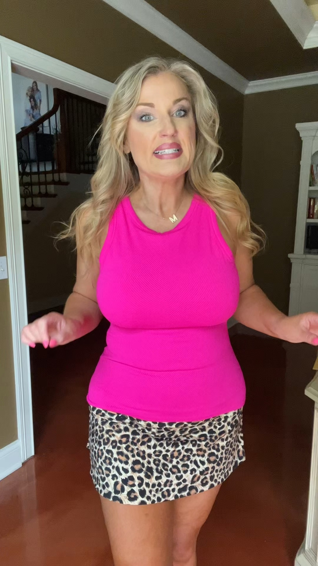 Hot pink racer back tank. Built in bra. Leopard print tennis shirt.  Wearing large in both. 

Workout wear 

#LTKfitnessgoals #LTKActive #LTKMidsize