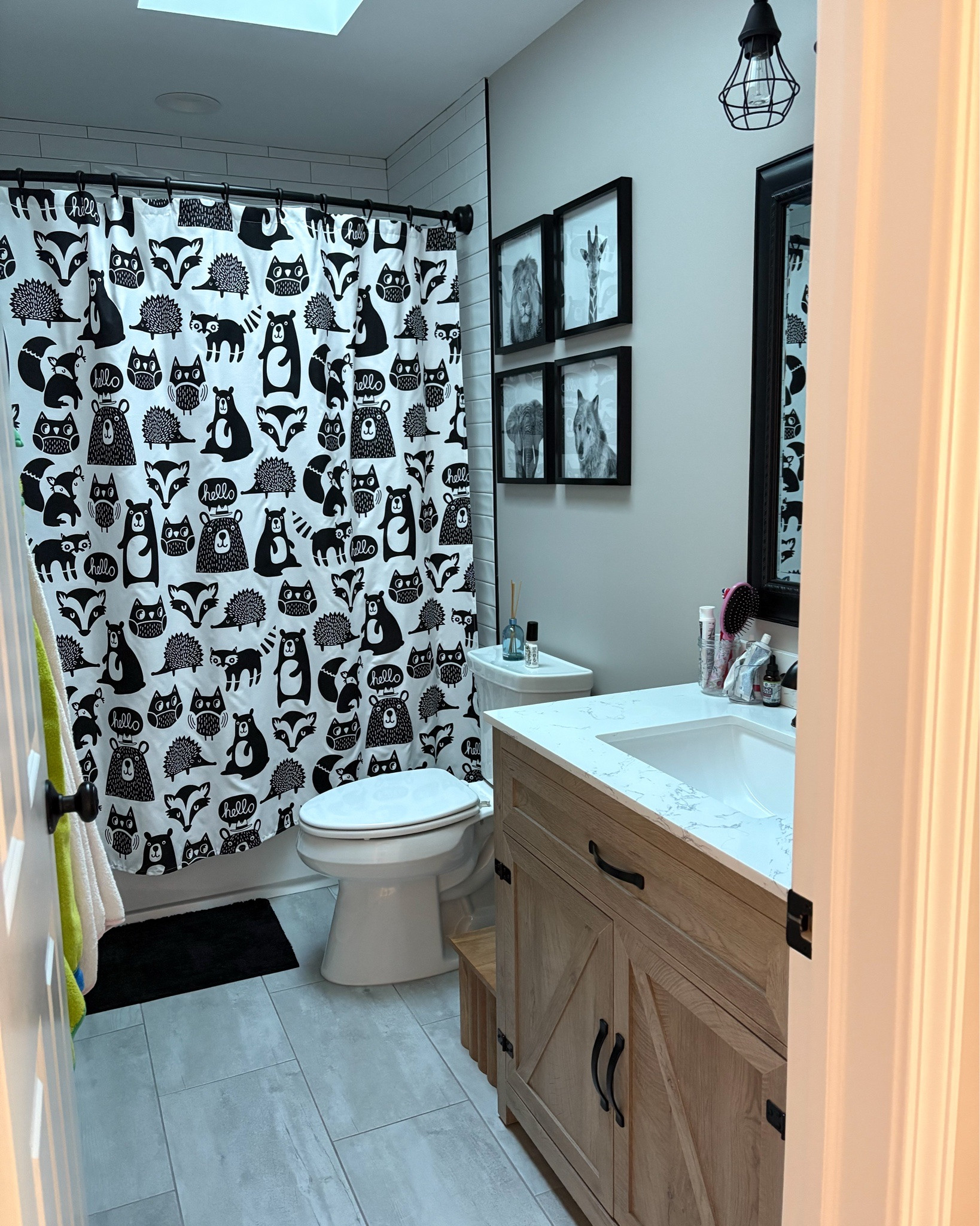 Kids bathroom refresh 🖤

Keeping it fun, clean, and functional in here! The black + white woodland shower curtain is such a hit with the kids, and I love how it keeps everything looking modern while still playful. Paired it with warm wood tones and simple accessories to make everyday routines a breeze 🙌

#LTKHome