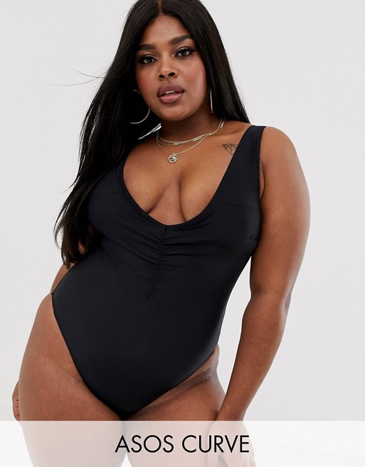 ASOS DESIGN curve v front ruched detail swimsuit in black | ASOS US