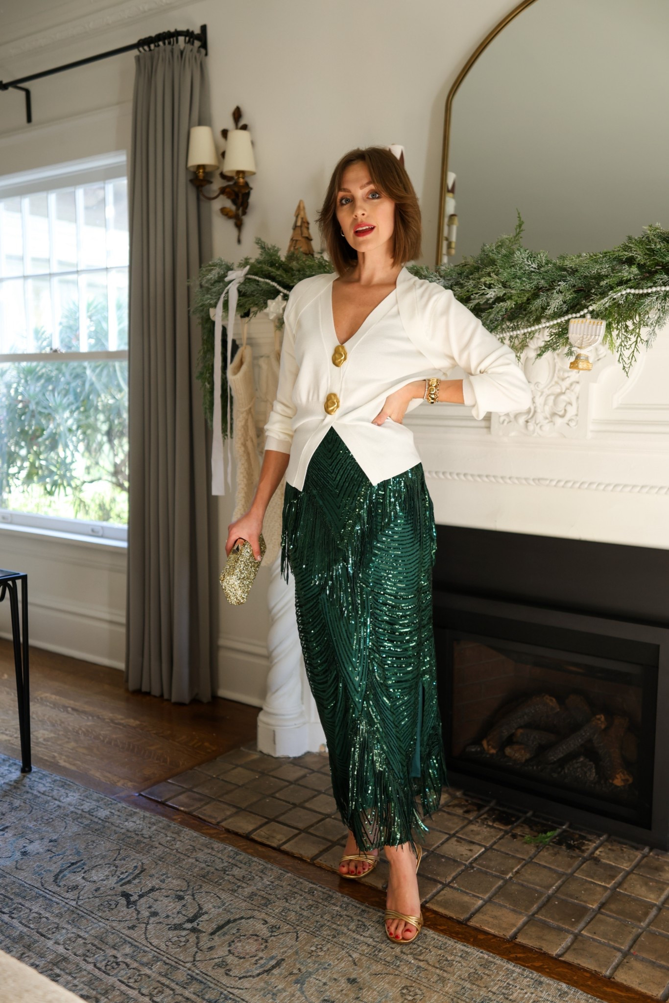 Green sequin skirt 
White sweater gold buttons wearing XS 
gold heels 
Holiday outfits, party outfits, Christmas party outfits

#LTKCyberWeek #LTKHoliday #LTKootd
