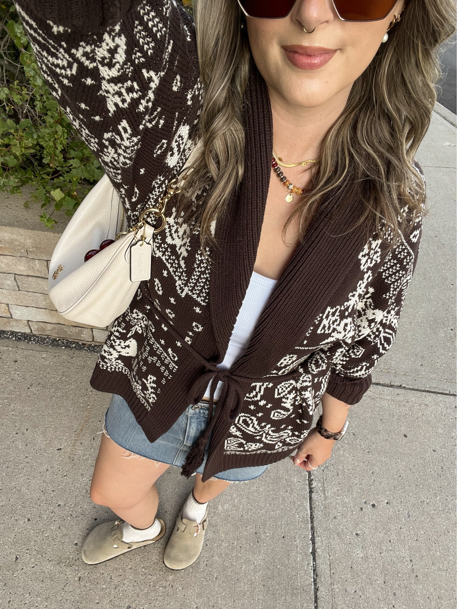 Fall outfit from Abercrombie on sale! Wearing L in the bandana print cardigan (not itchy at all!). Wearing M in the bra free tank top. I bought this denim skirt last year in a size 32, would do a 31 if I was purchasing now. I wear a 30 in A&F 90s relaxed jeans for reference! I’m a 9.5-10 shoe and wear a 40 in the Birkenstock clogs

#LTKfall #LTKmidsize #LTKstyletip