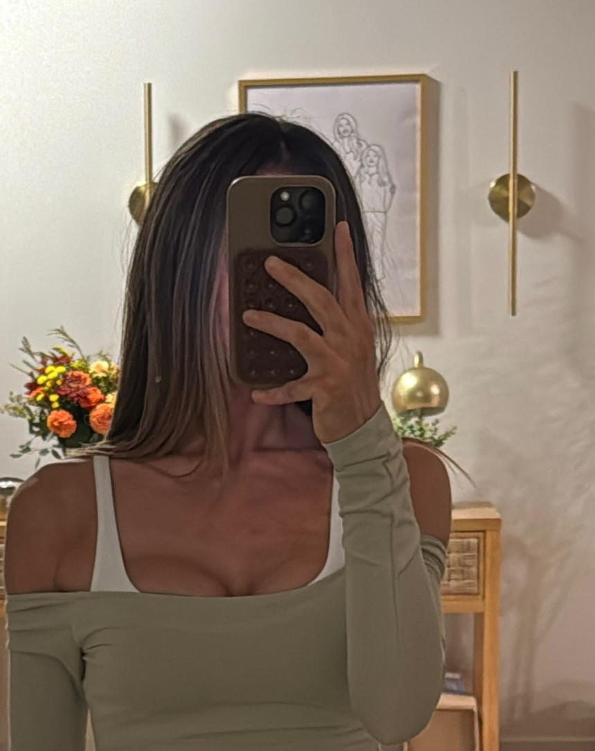 I always get so many questions about my phone case, so I am sharing details here. 🤎 Love the mix of chocolate tones & could not live without the Octobuddy! 

 #LTKStyleTip